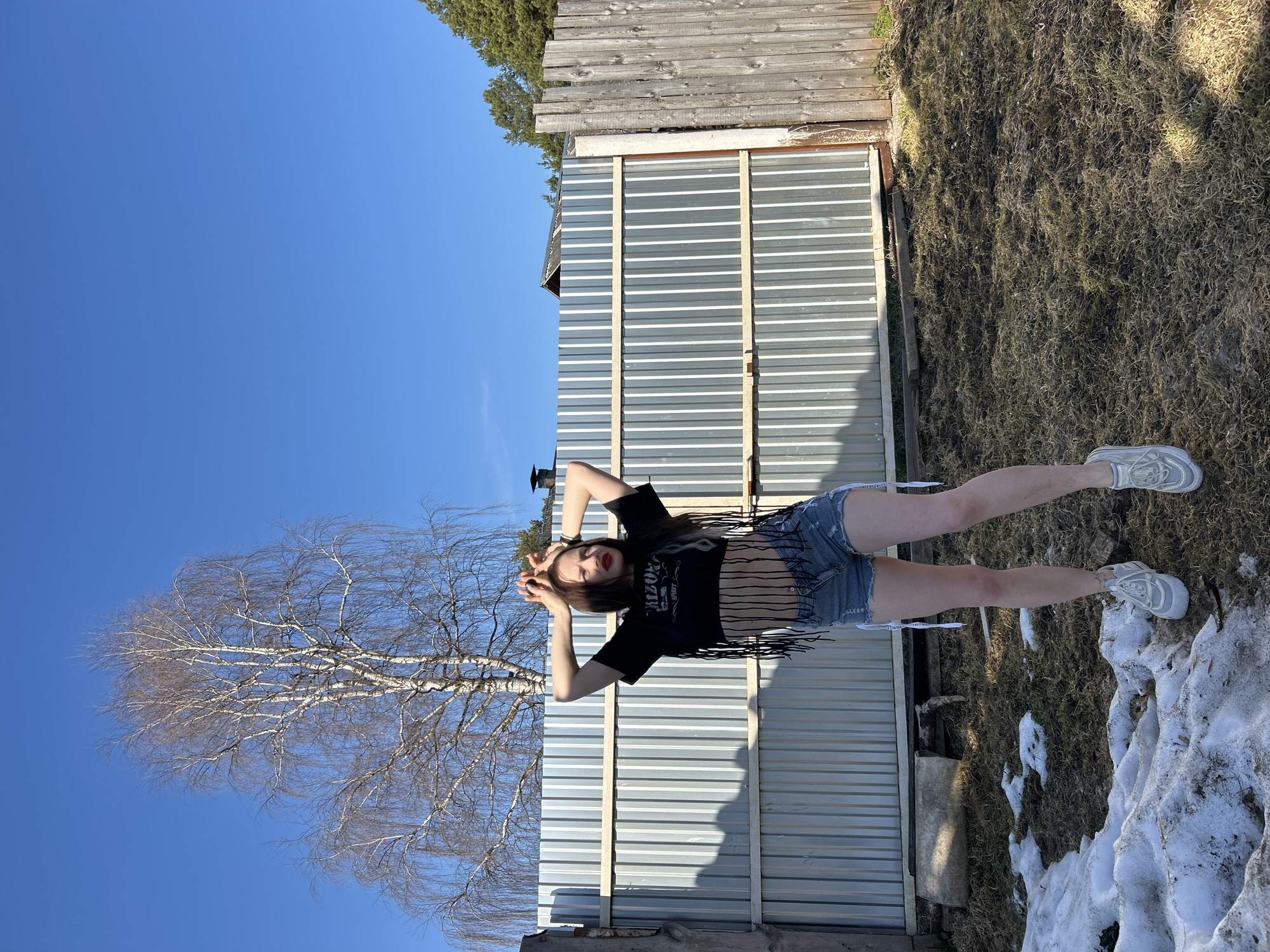Woman photographed outdoors in Rusalevka, Russia during spring morning