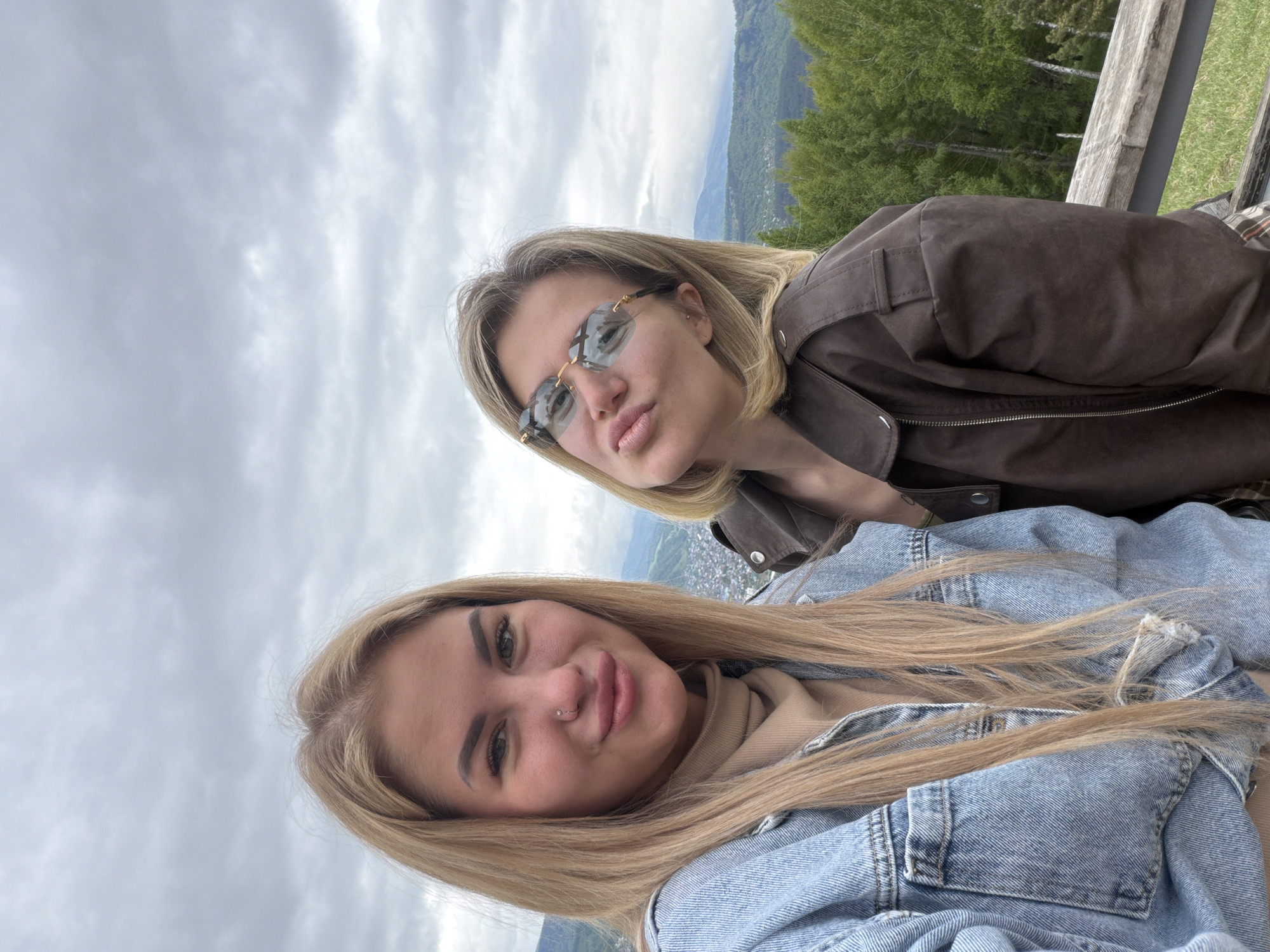 Two women pose for selfie in Gorno-Altaysk, Russia