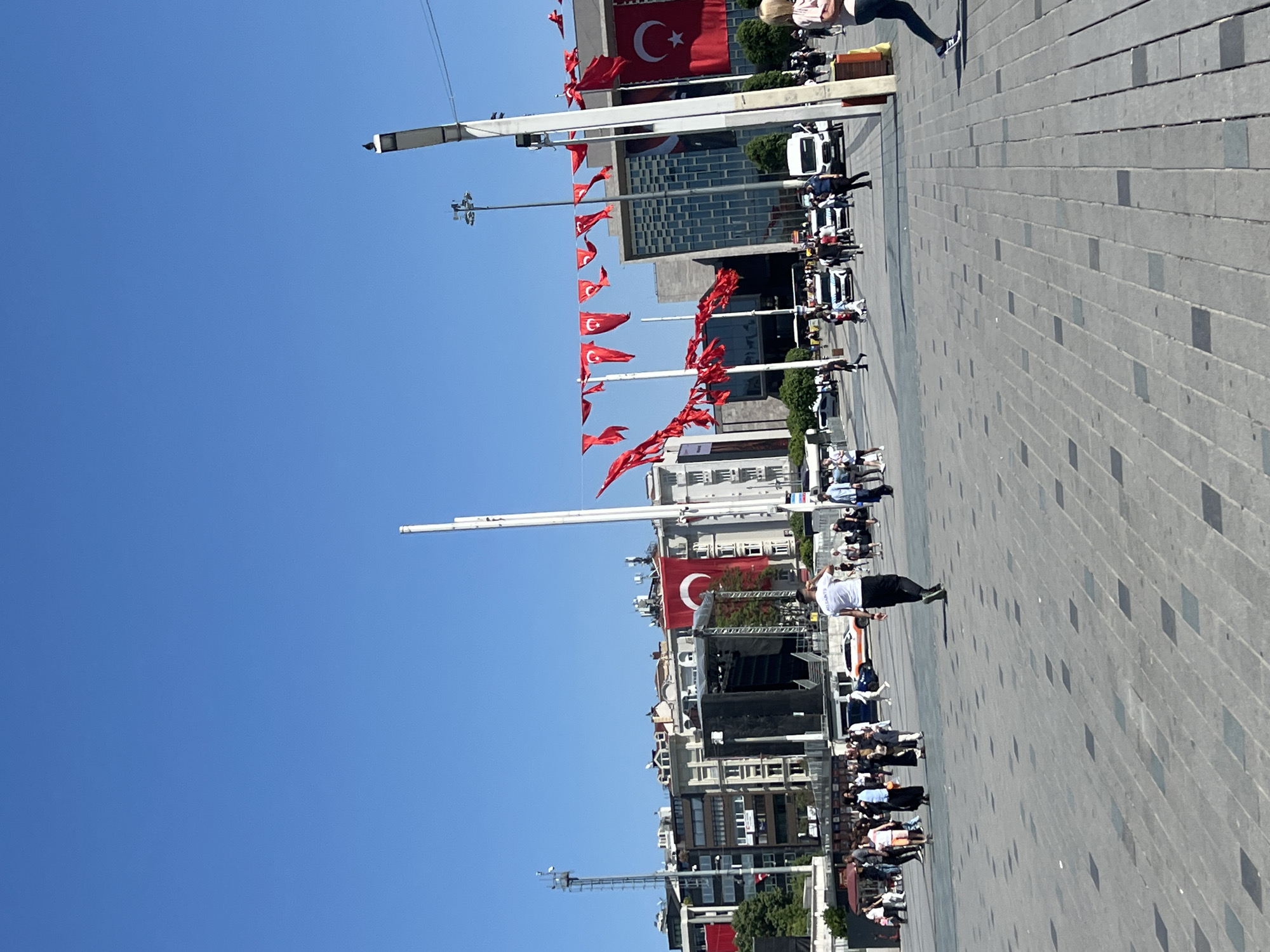 Crowds gather with Turkish flags in Istanbul's Taksim Square