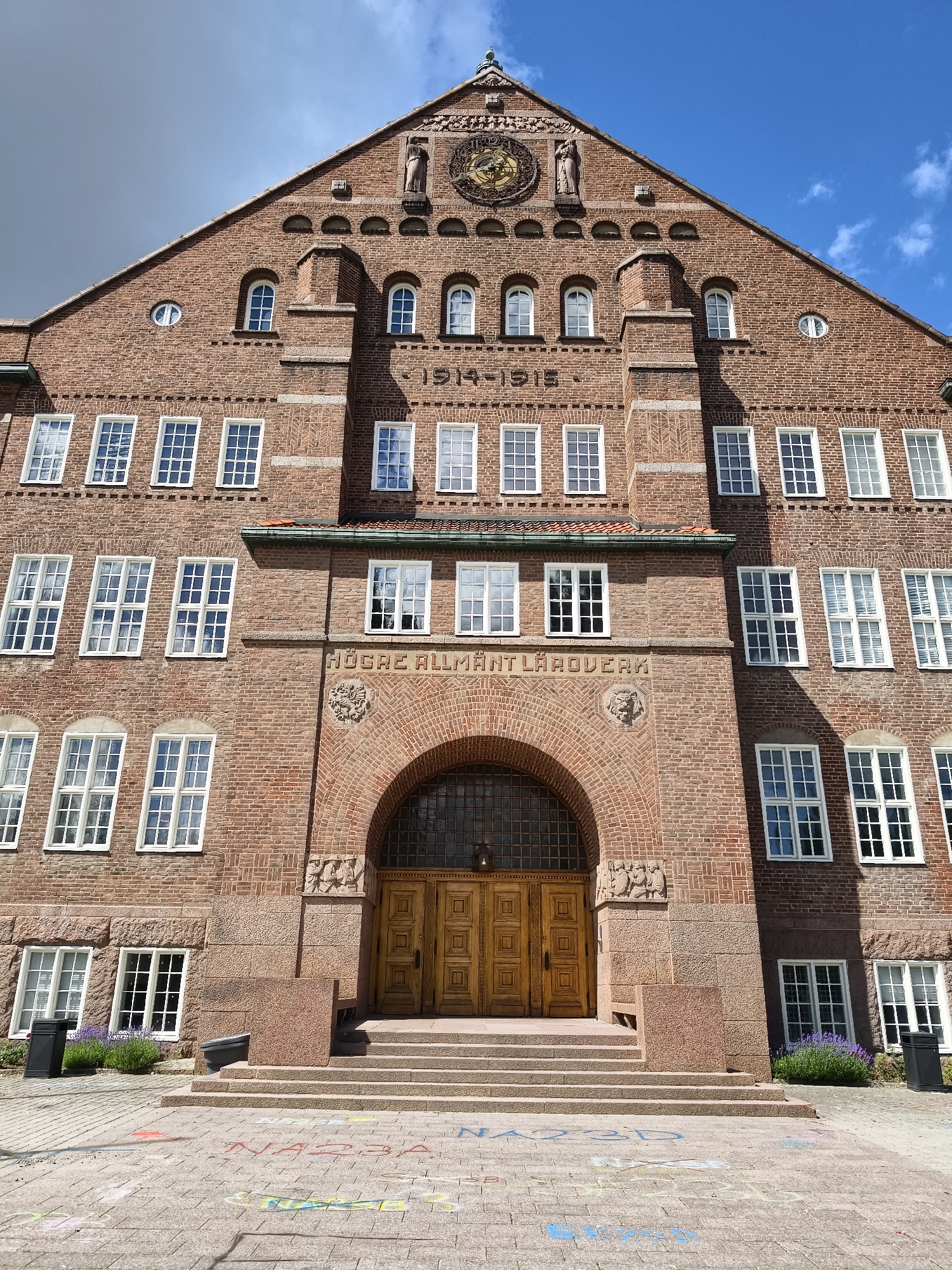 Roses, ponds, and historic brick in summer Linköping