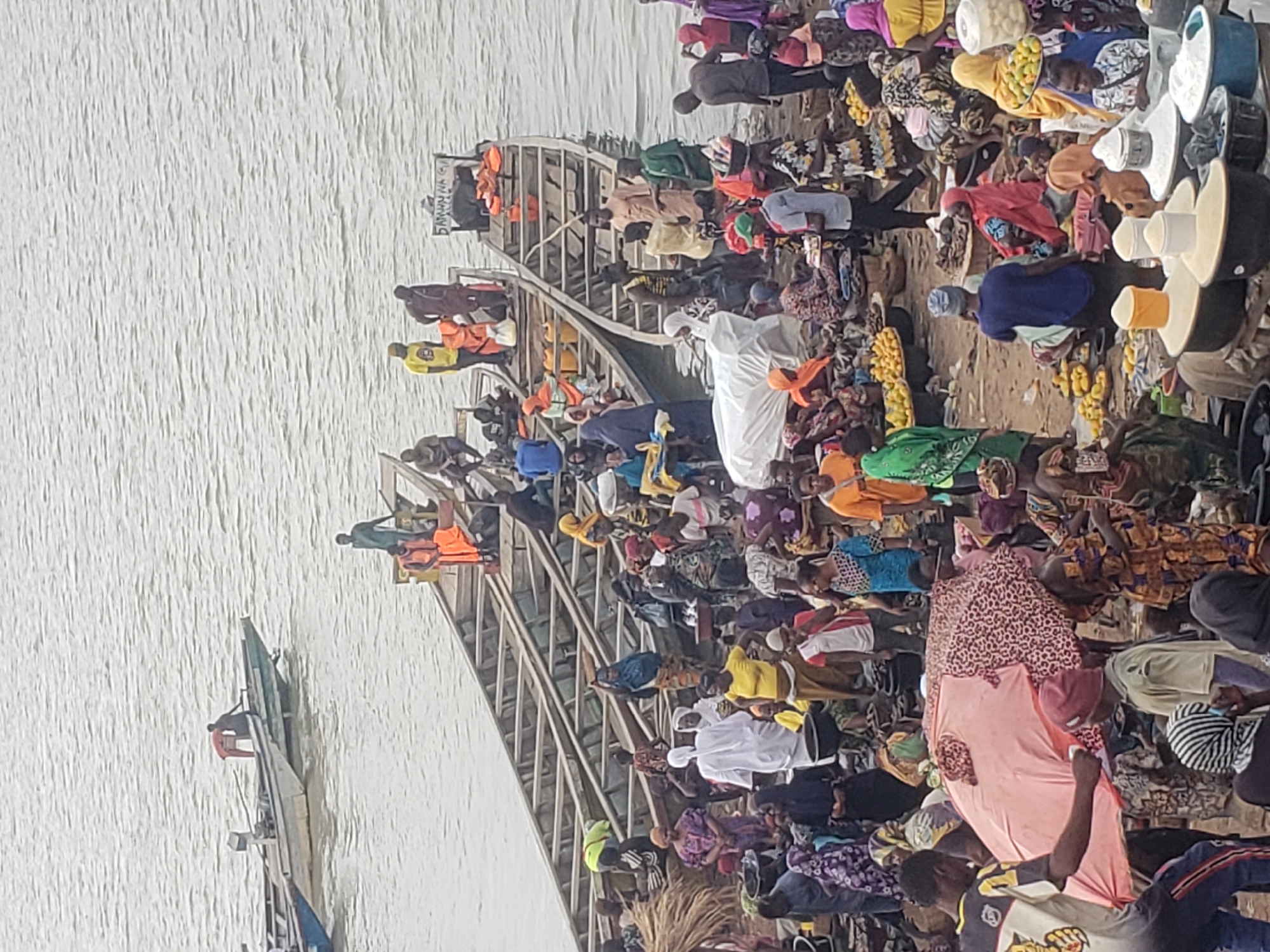 Busy riverside markets and boat transport documented in Lokoja