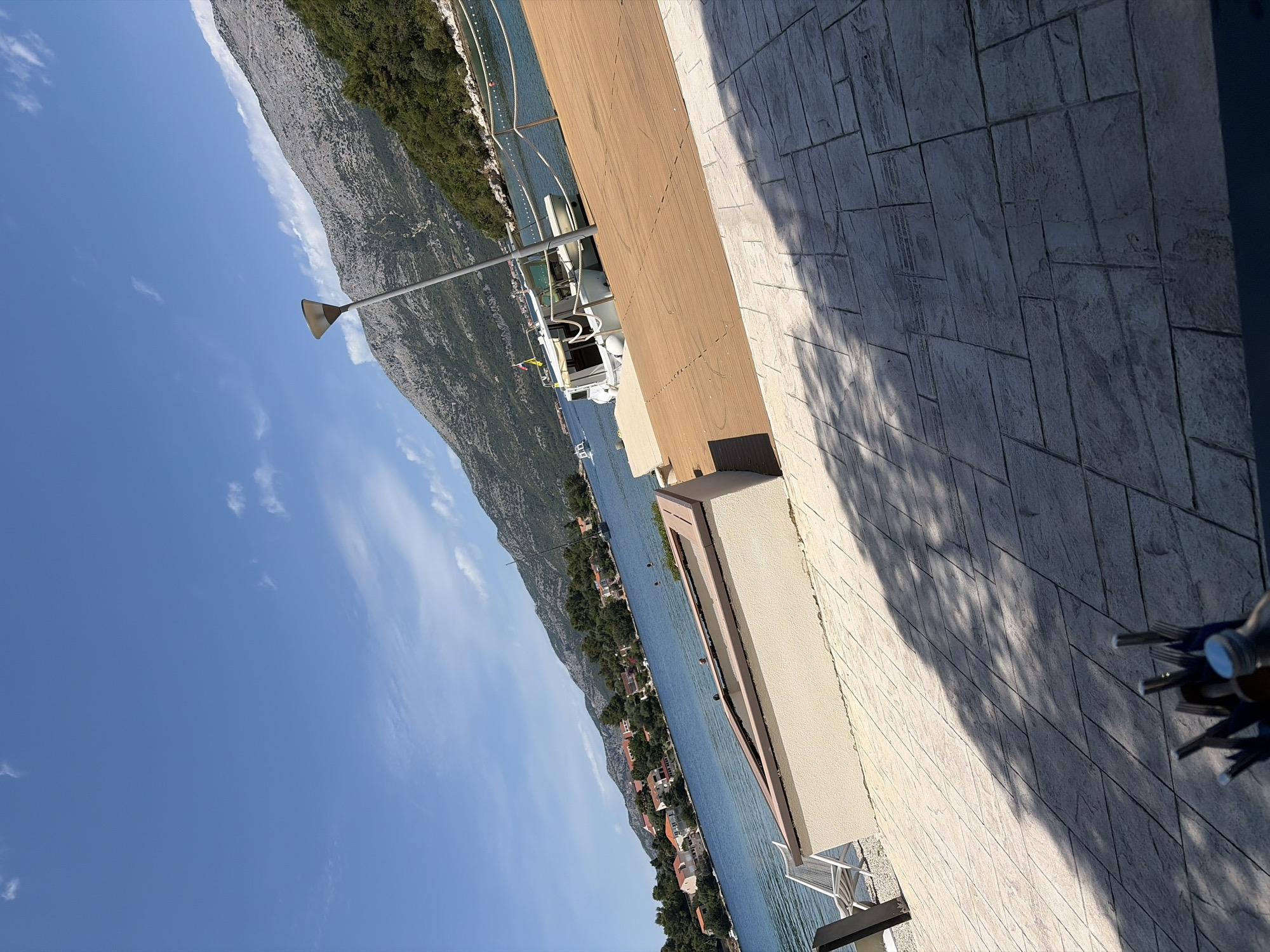 Sunny waterfront dining views documented in Korčula, Croatia