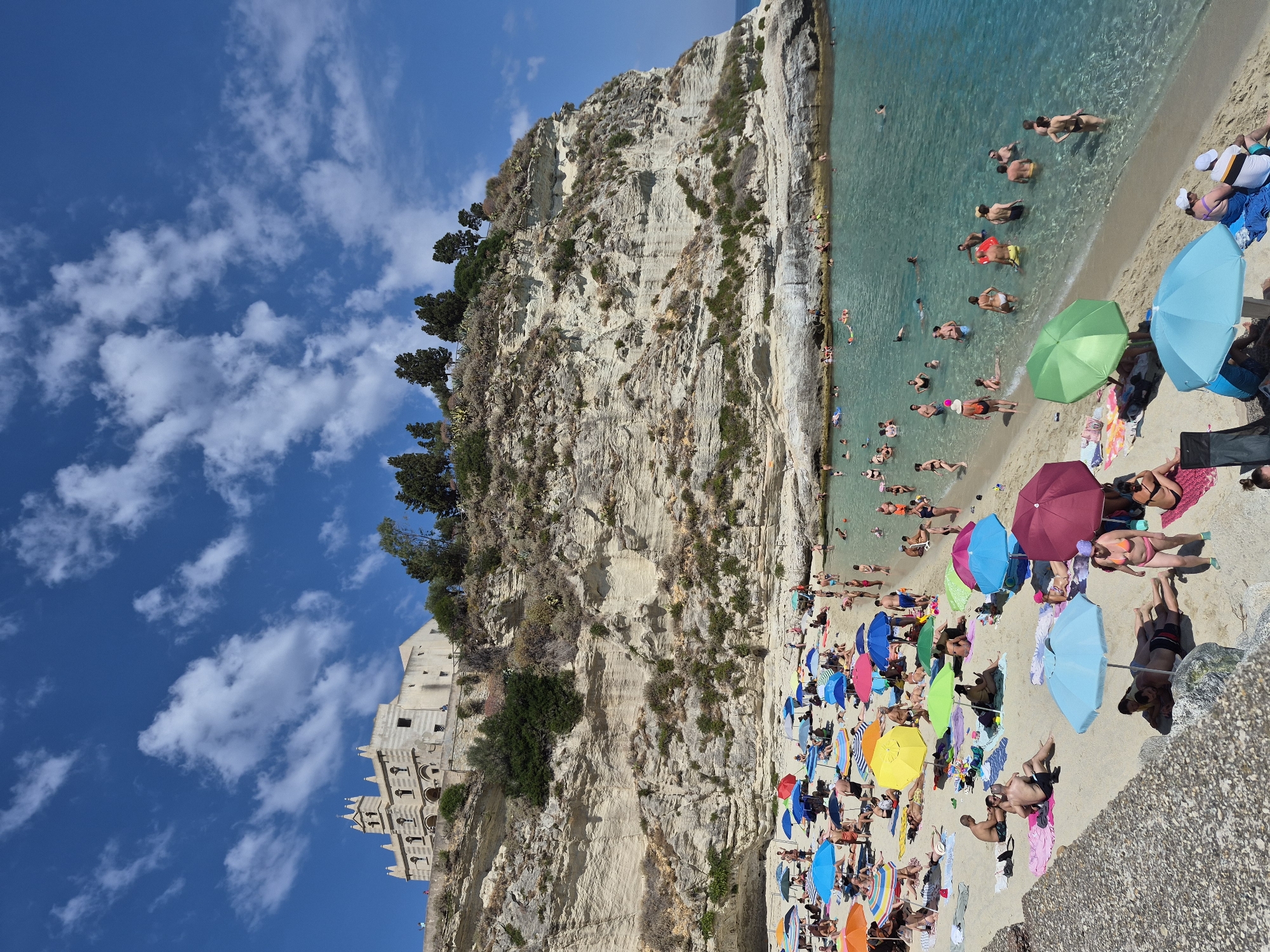 Tropea's beach, cliffs, and sanctuary on a sunny morning