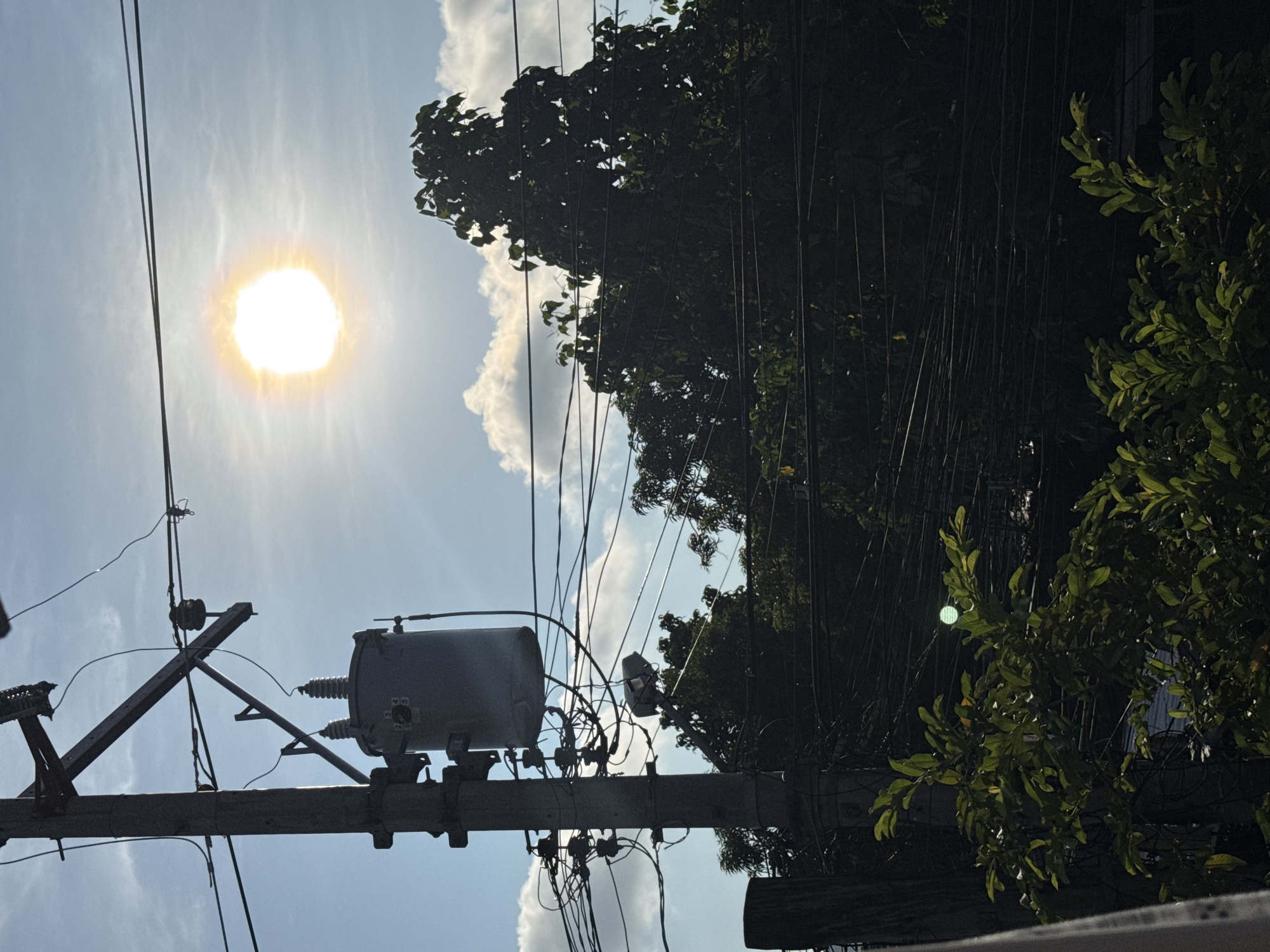 Davao City resident documents power lines and infrastructure during daylight