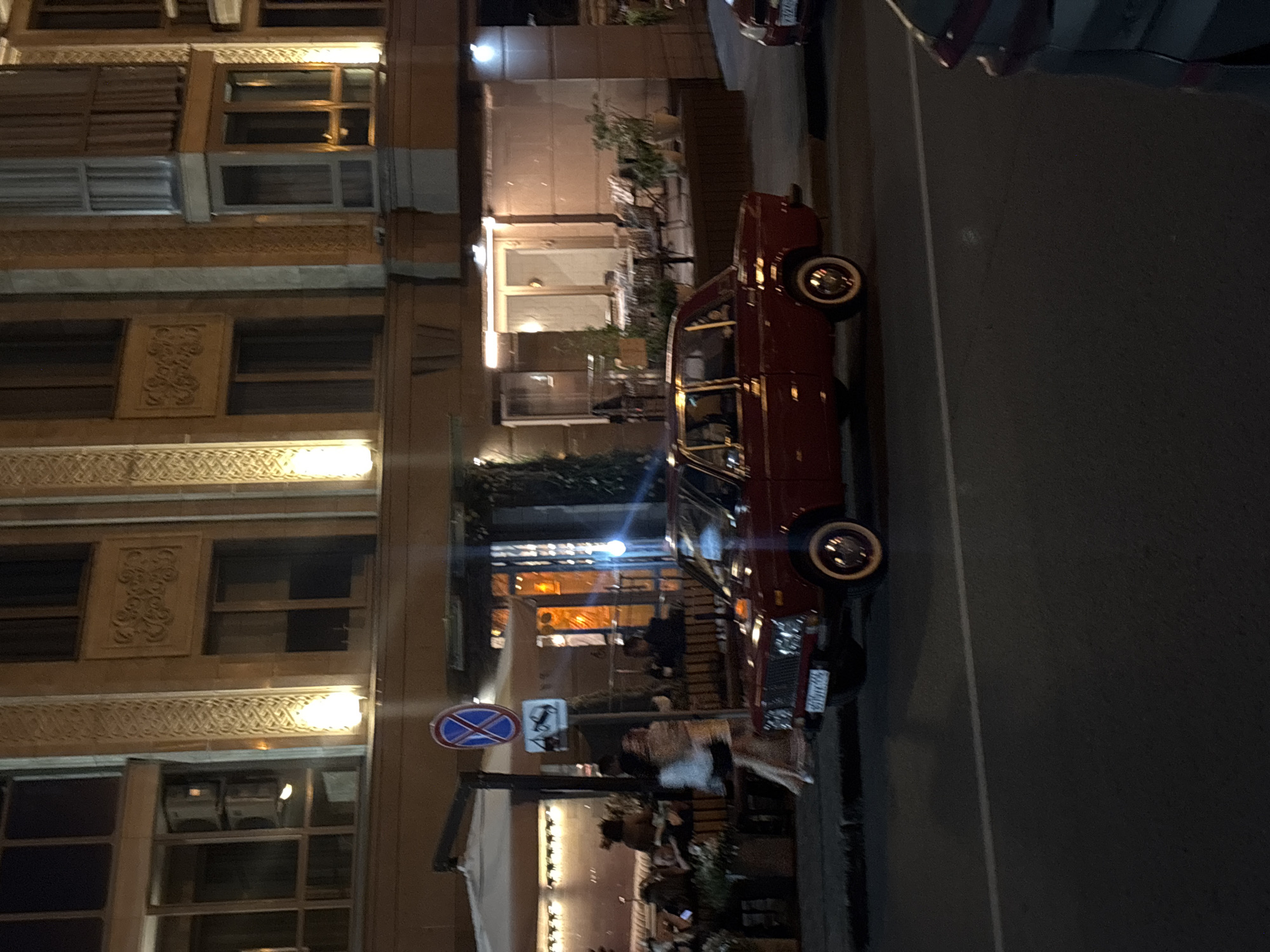 Kazan bar night, vintage car outside and bottle chandelier within