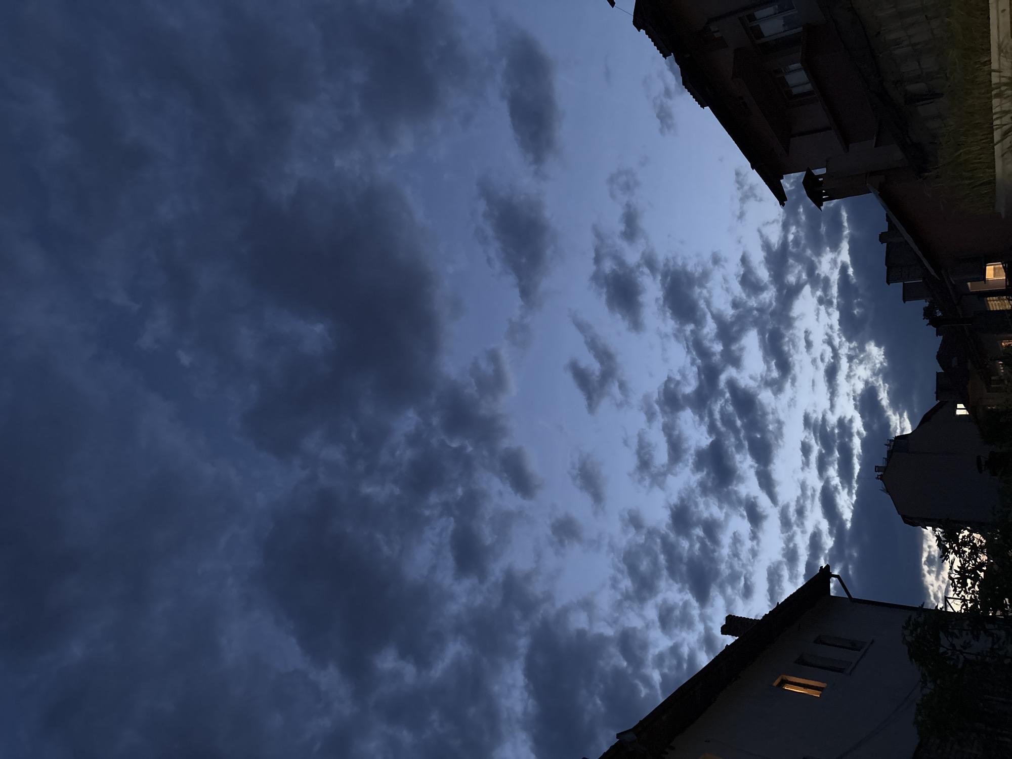 Dramatic dusk cloudscape photographed over Varna, Bulgaria residential area