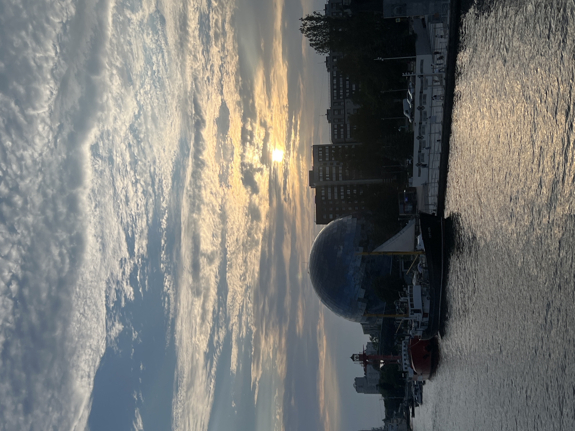 Kaliningrad waterfront at sunset, boats and landmarks in view