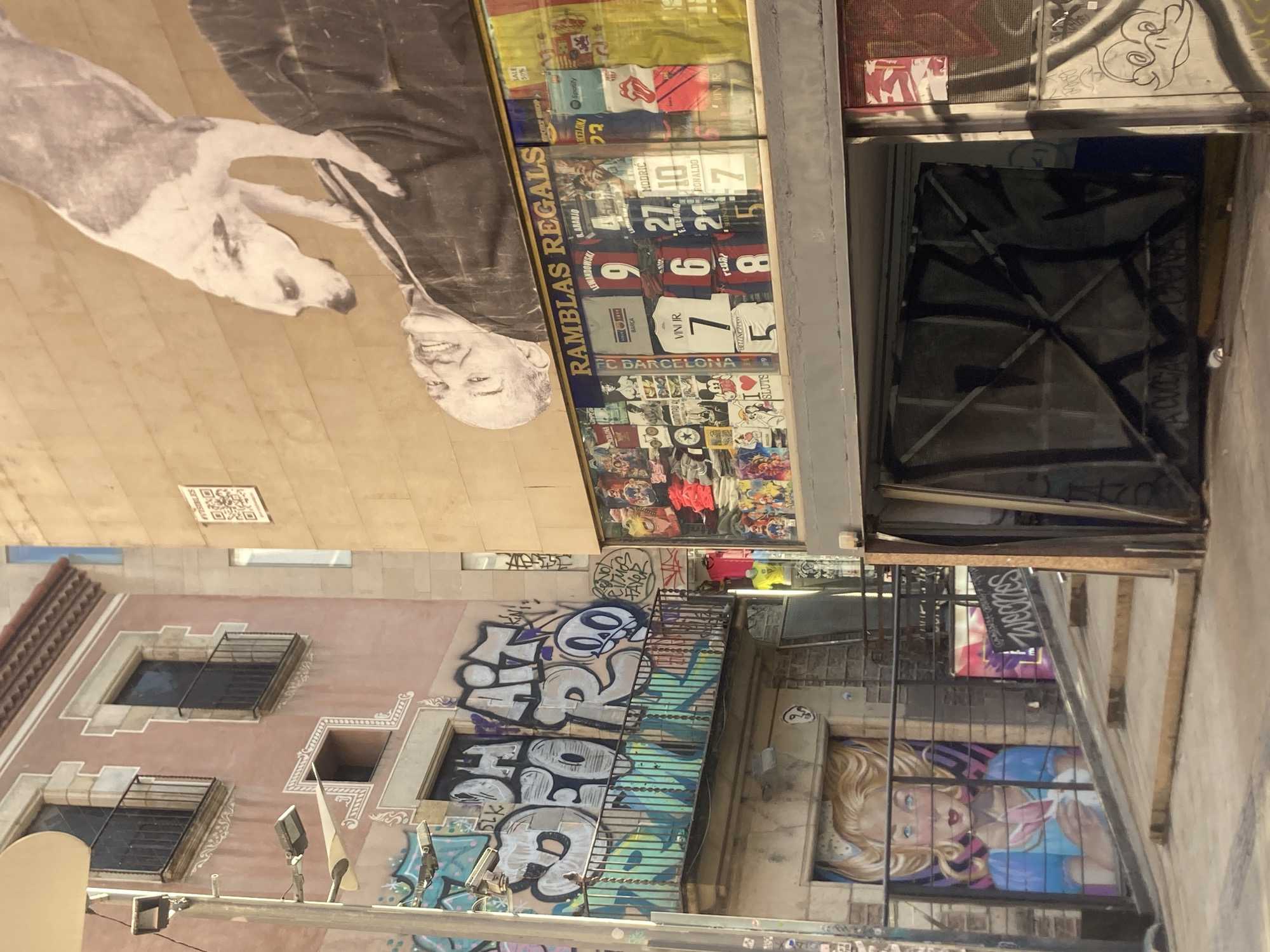 Street-level Barcelona: Modernista landmarks meet graffiti-covered storefronts