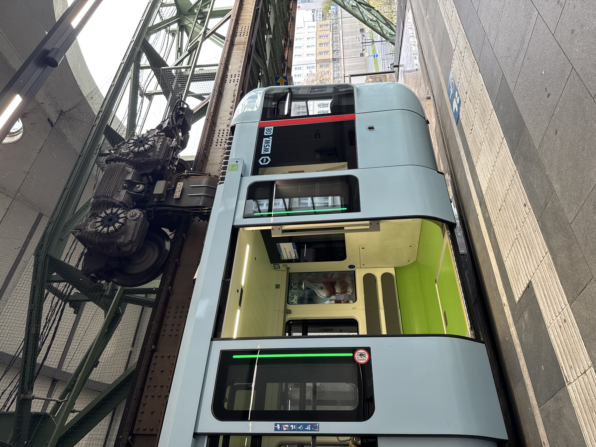 Wuppertal suspension train carries passengers through German station