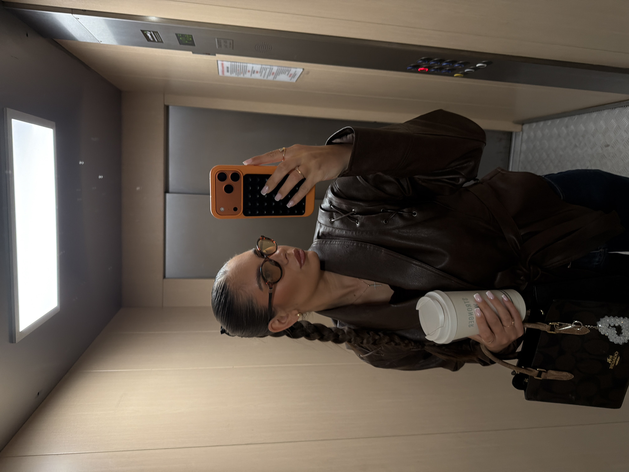 Woman Takes Morning Elevator Selfie in Krasnoyarsk