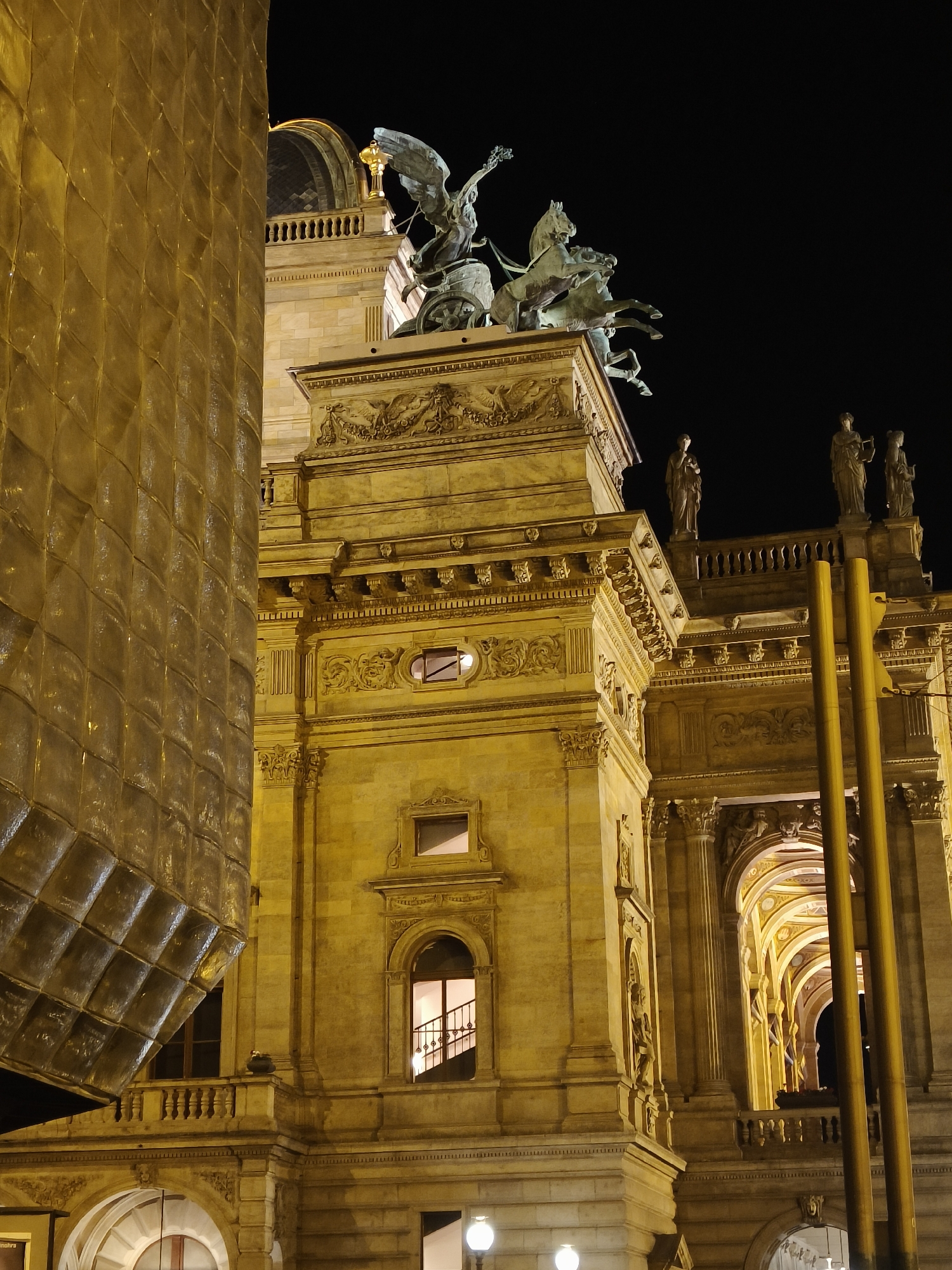 Prague National Theatre district captured in nighttime street scenes