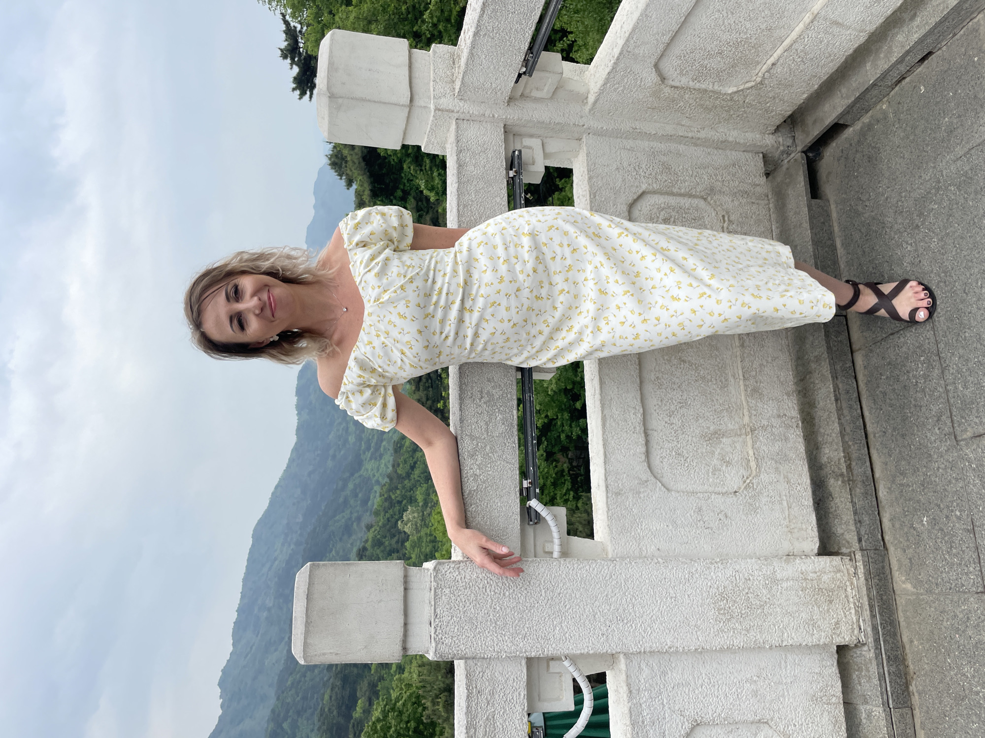 Morning tourists pose at scenic Huairou District overlook