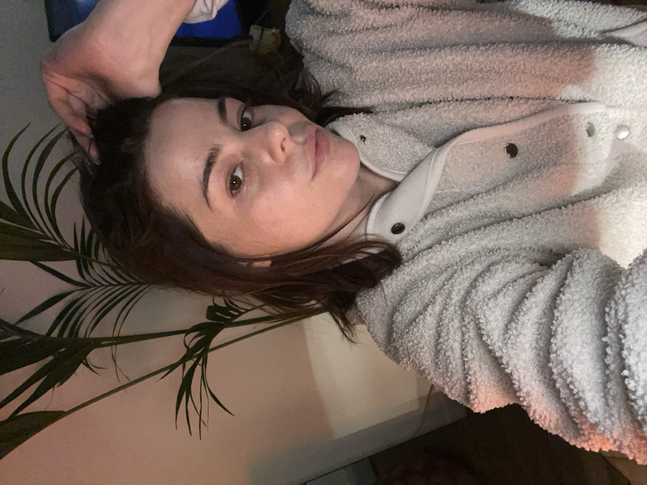 Couple documents evening routine together in Roubaix apartment