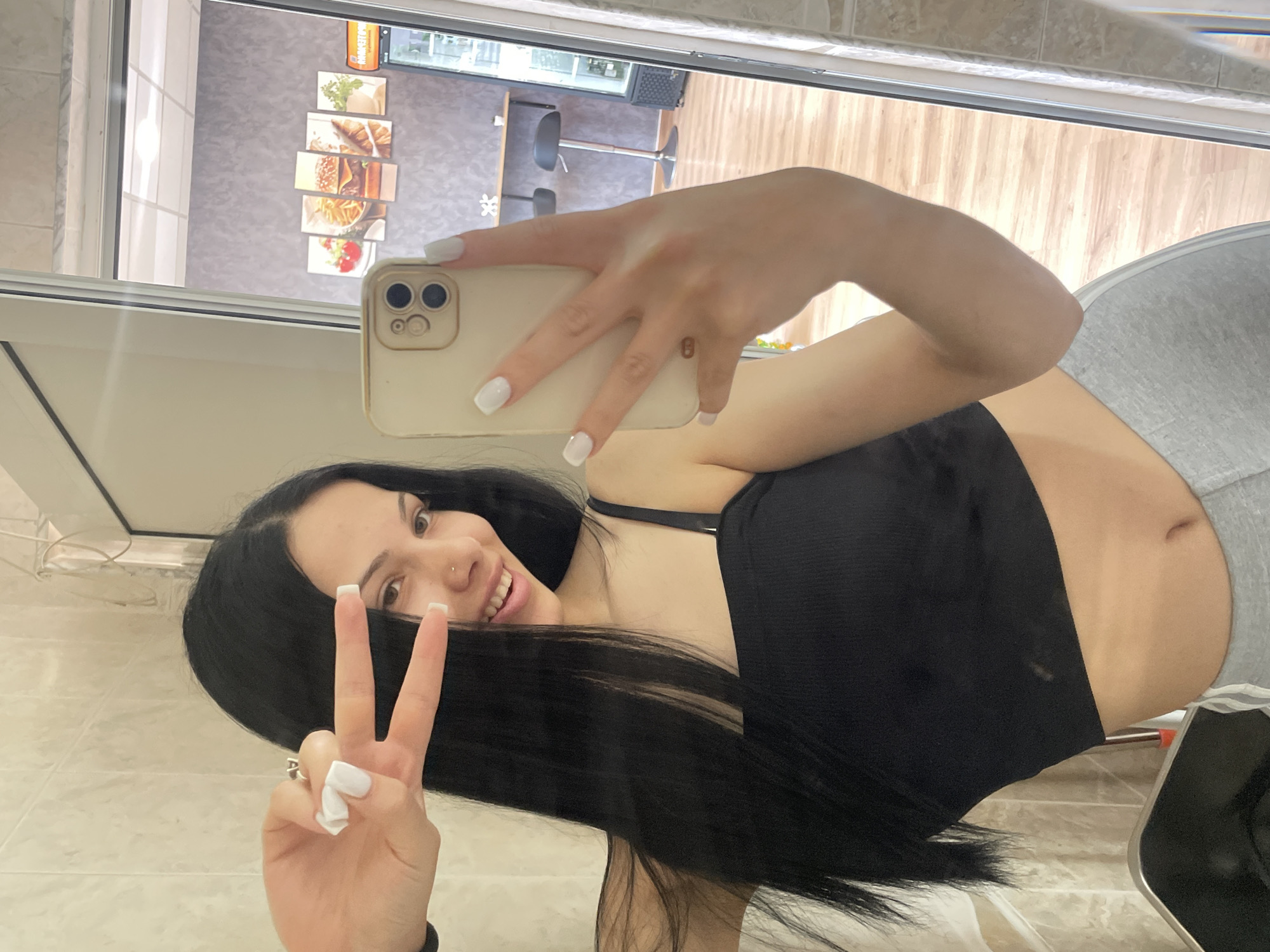 Woman documents casual moments through selfies in Stara Zagora