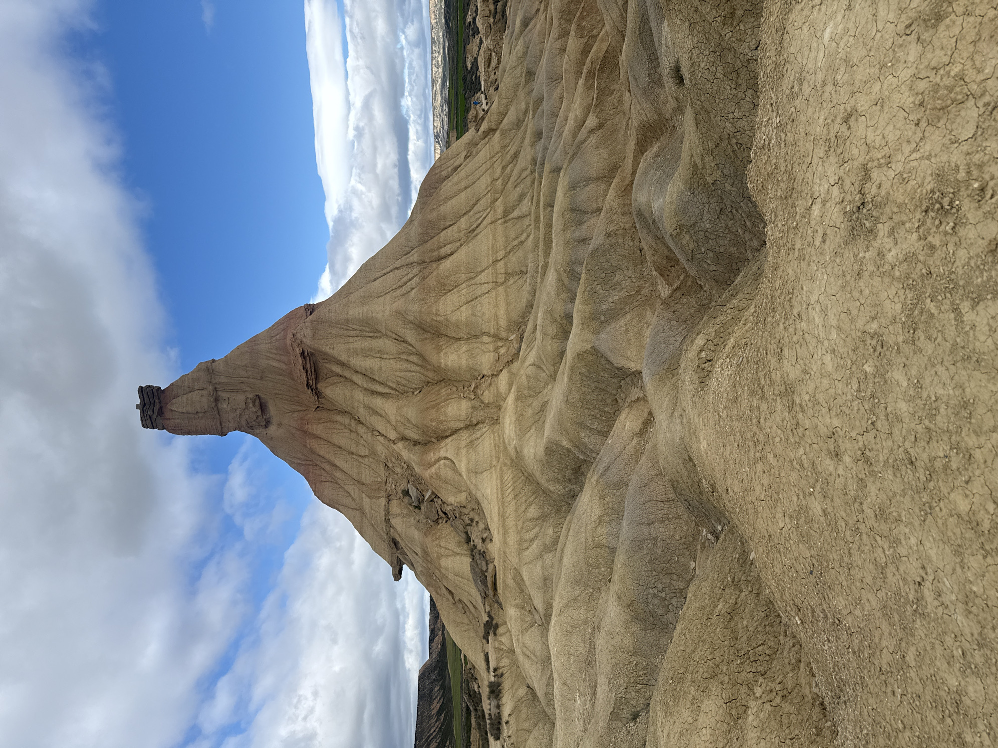 Desert rock formation photographed under blue skies