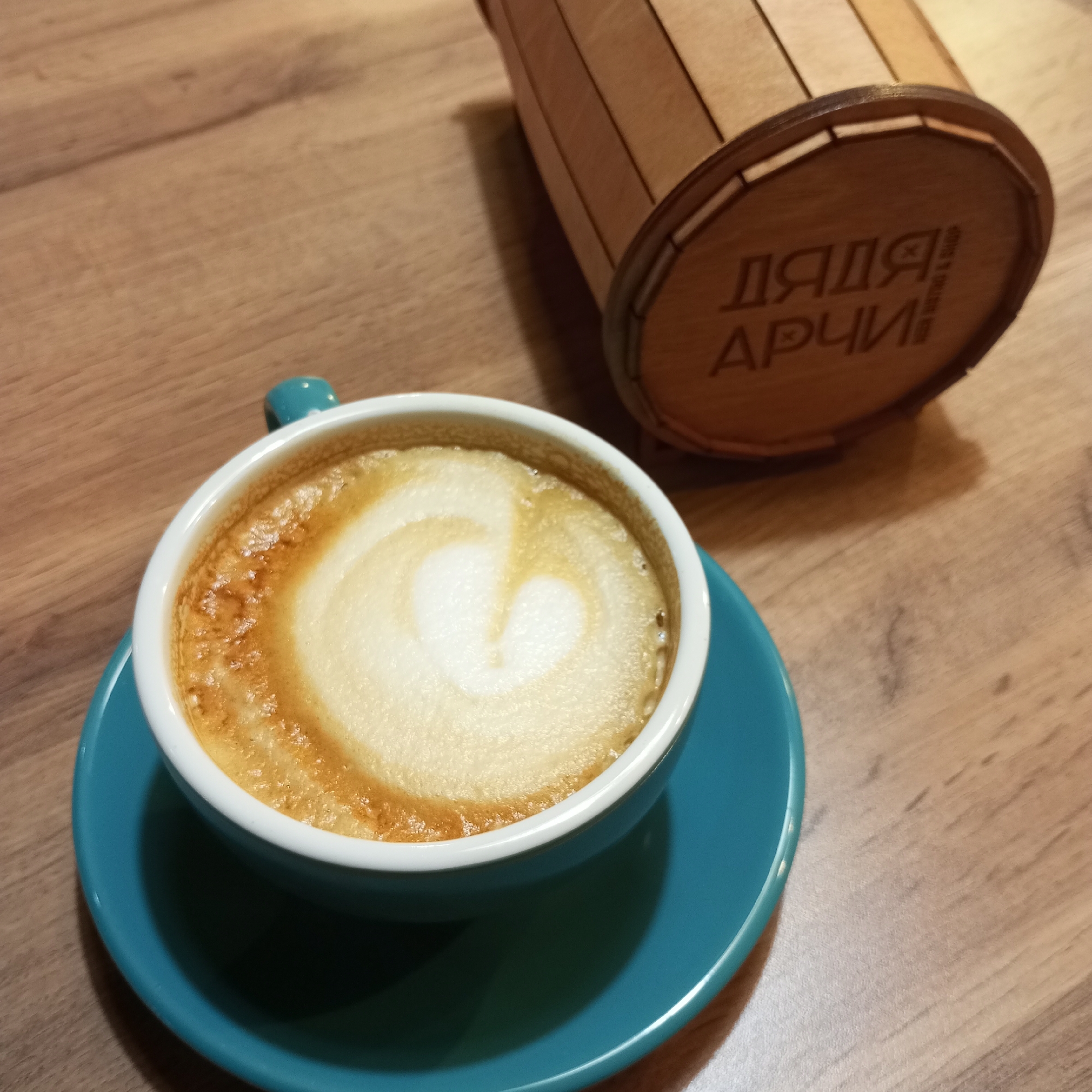 A rainy afternoon around Pervomaysky's apartments, cafés, and sculptures