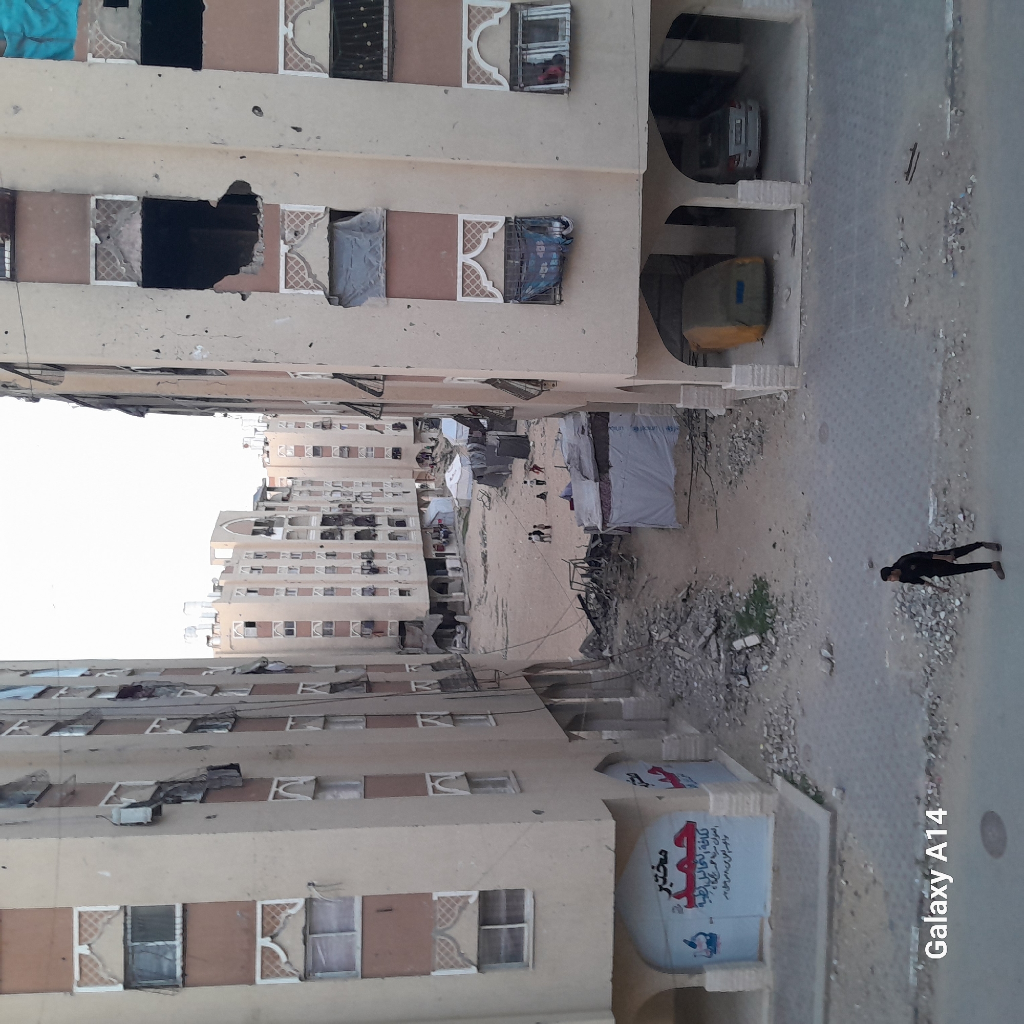 Damaged buildings and tent shelters documented in Khan Yunis
