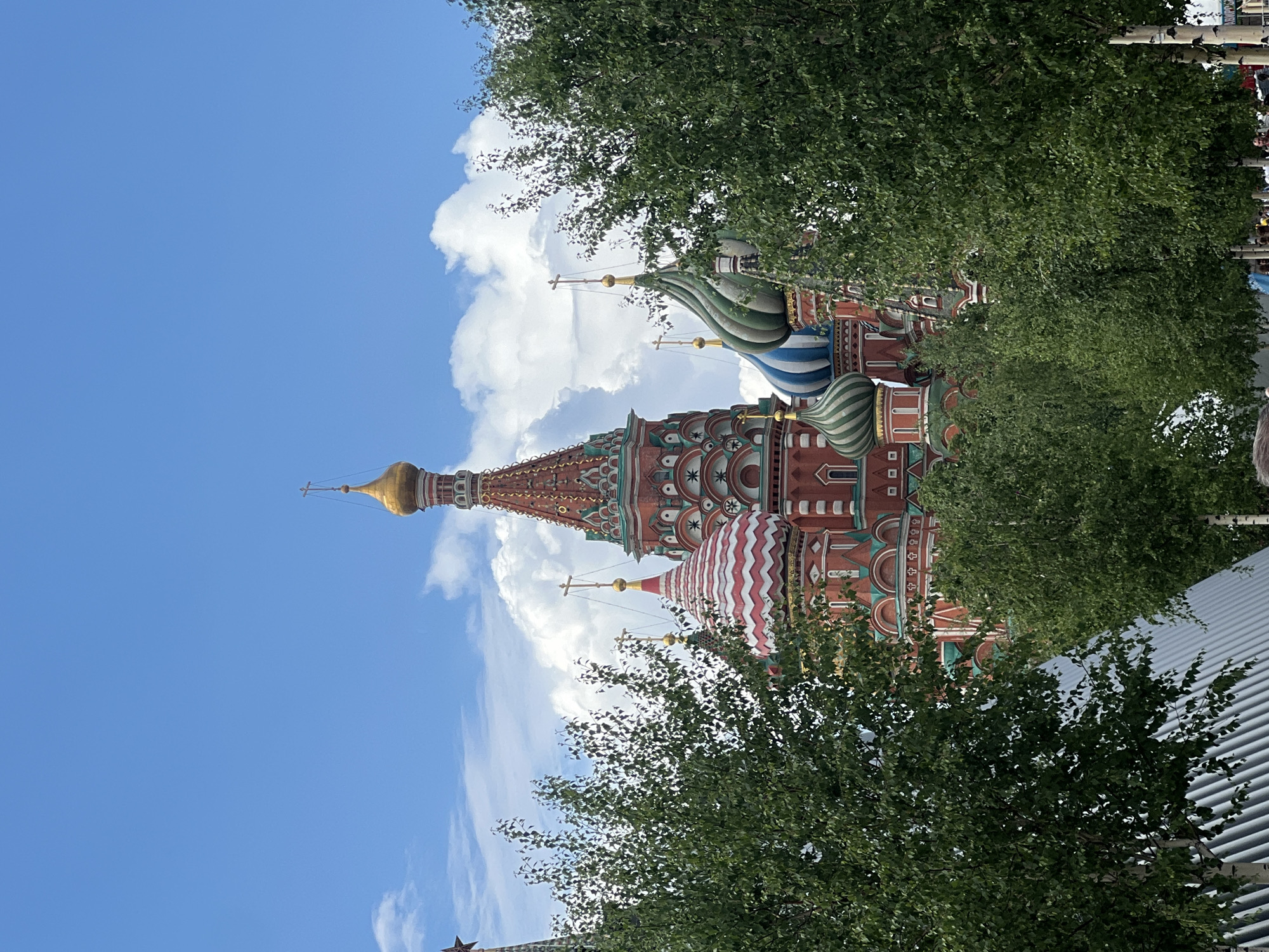 Tourist activity with doves captured at Moscow's Saint Basil's Cathedral