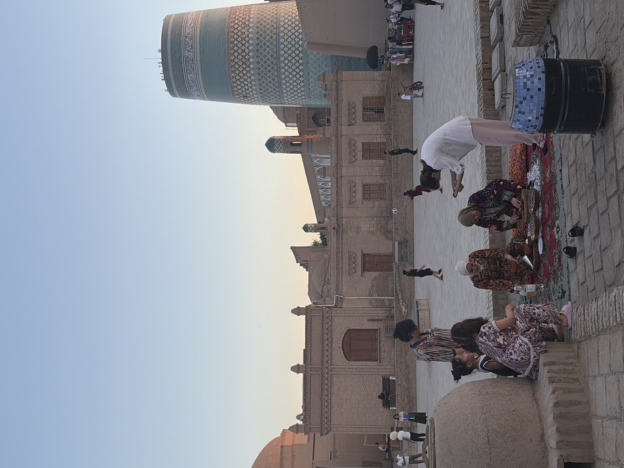 Afternoon tourism and daily life captured in historic Khiva