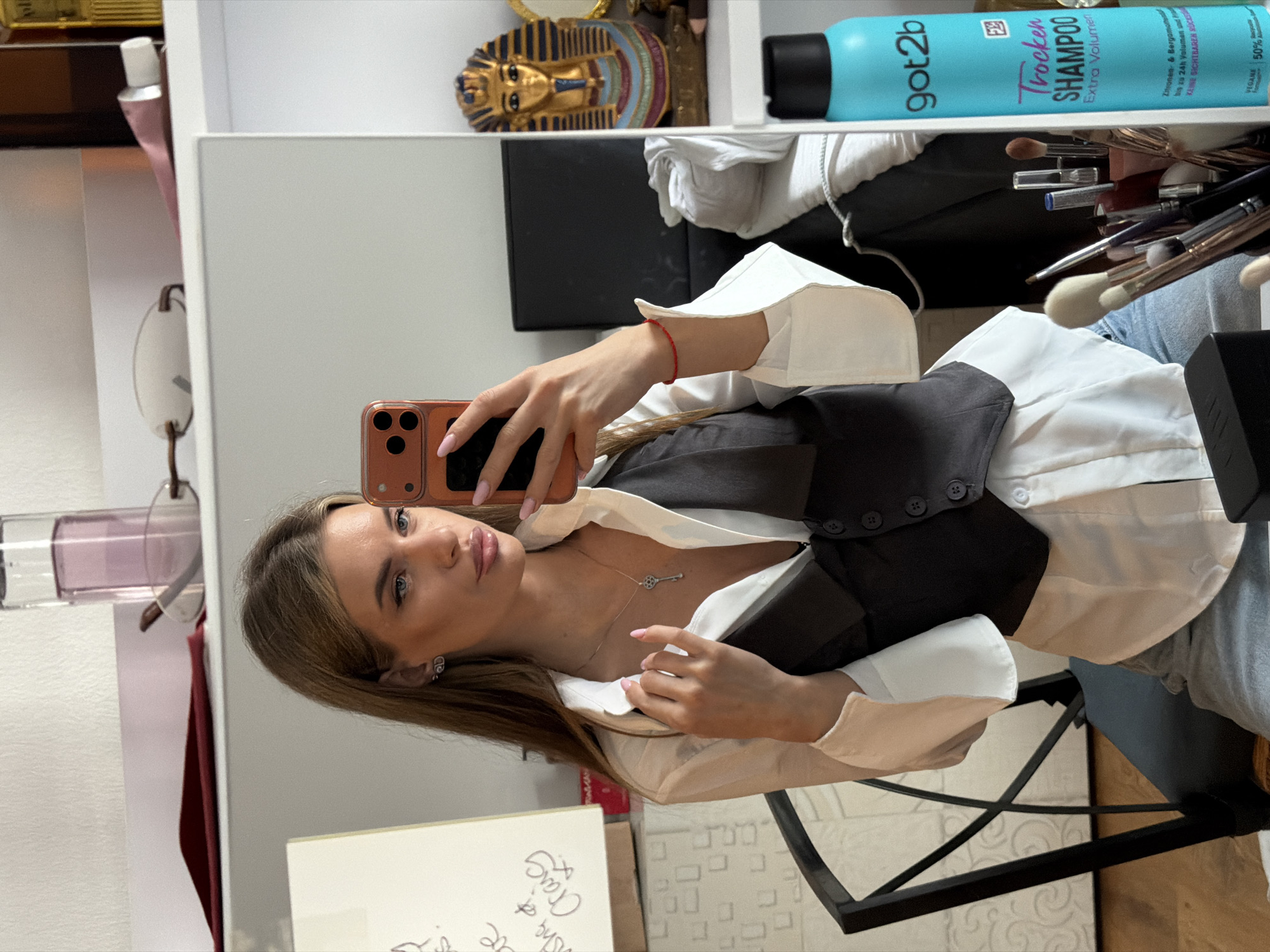 Woman Takes Mirror Selfie in Berlin Bathroom