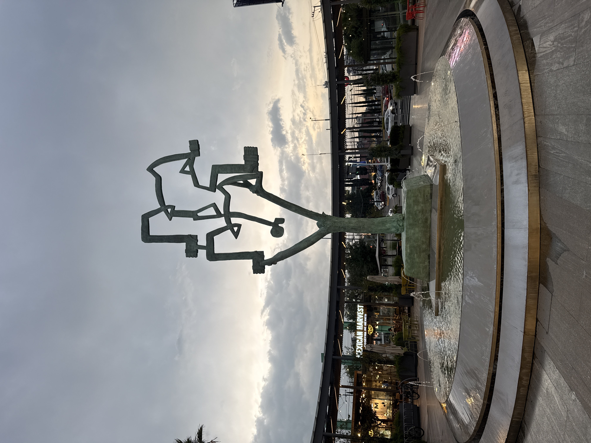 Modern sculpture and fountain observed in Puebla public space