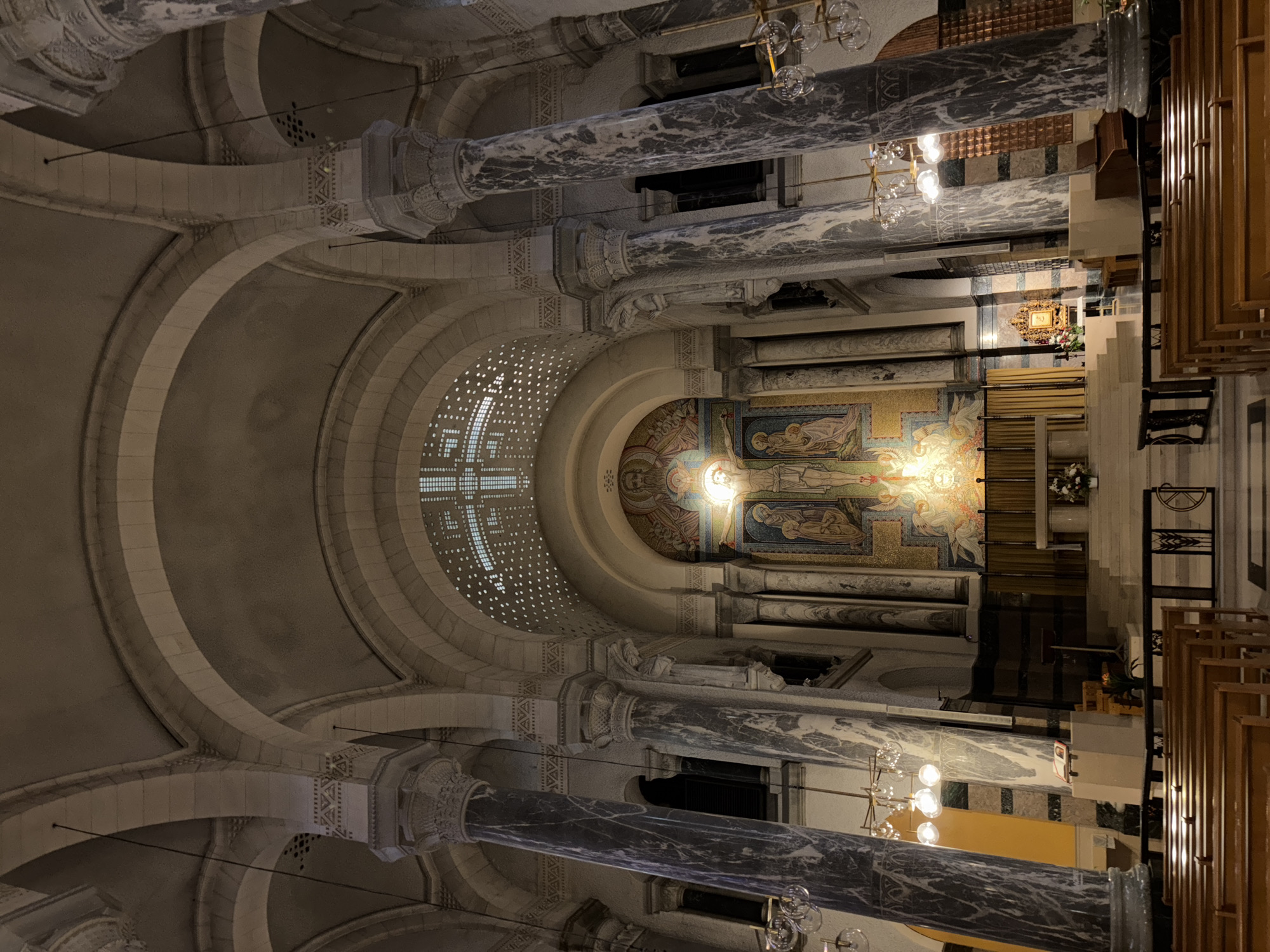 Tourist documents Annecy basilica and city views on cloudy day