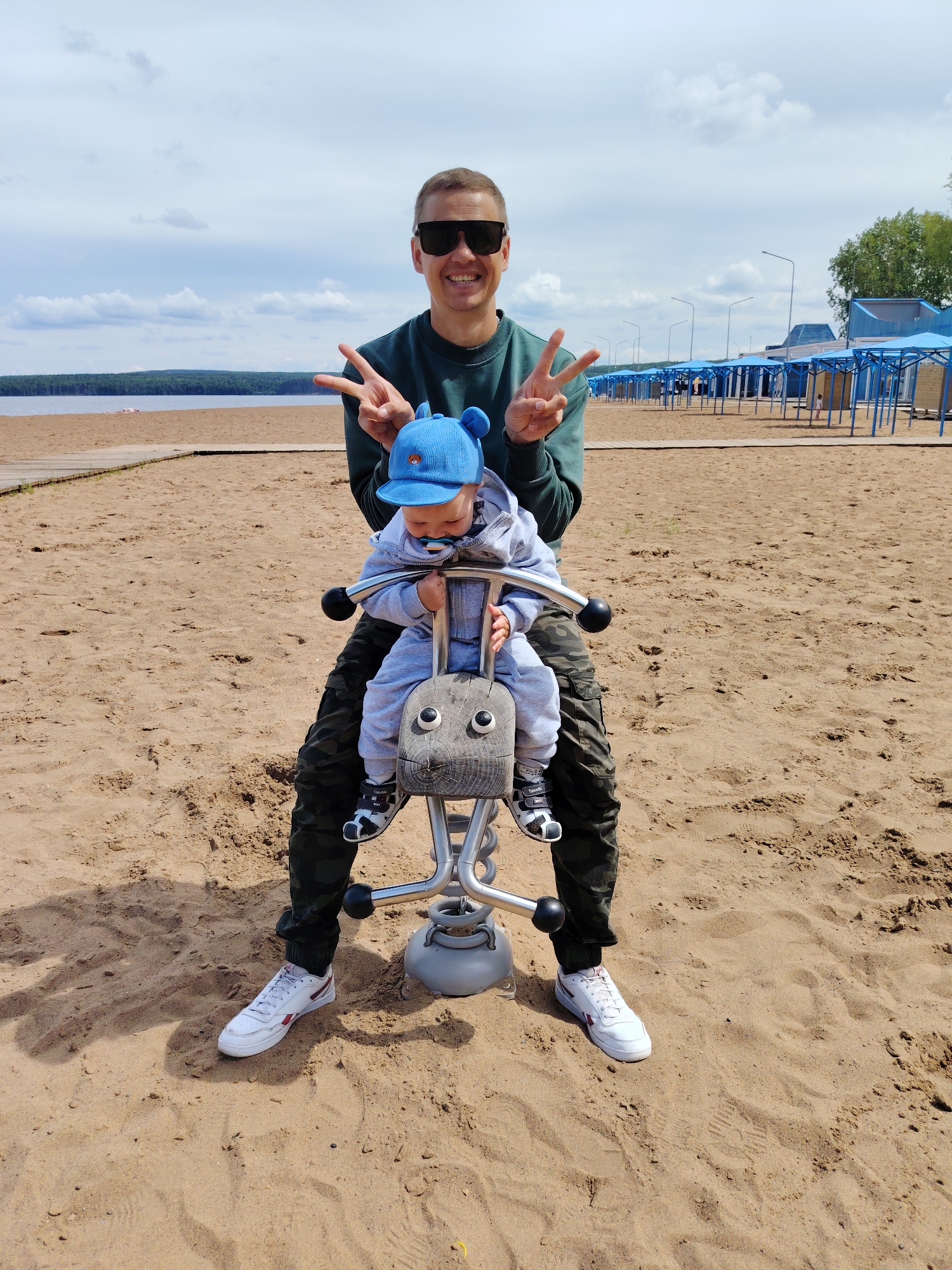 Family enjoys beach playground outing in Chaikovsky Russia
