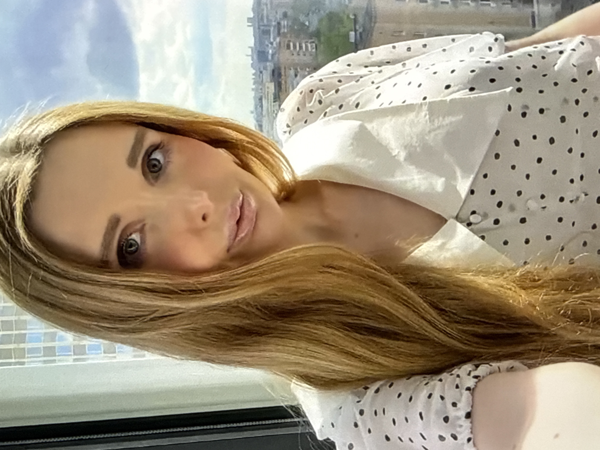 Selfie session across two outfits, bathroom and window settings