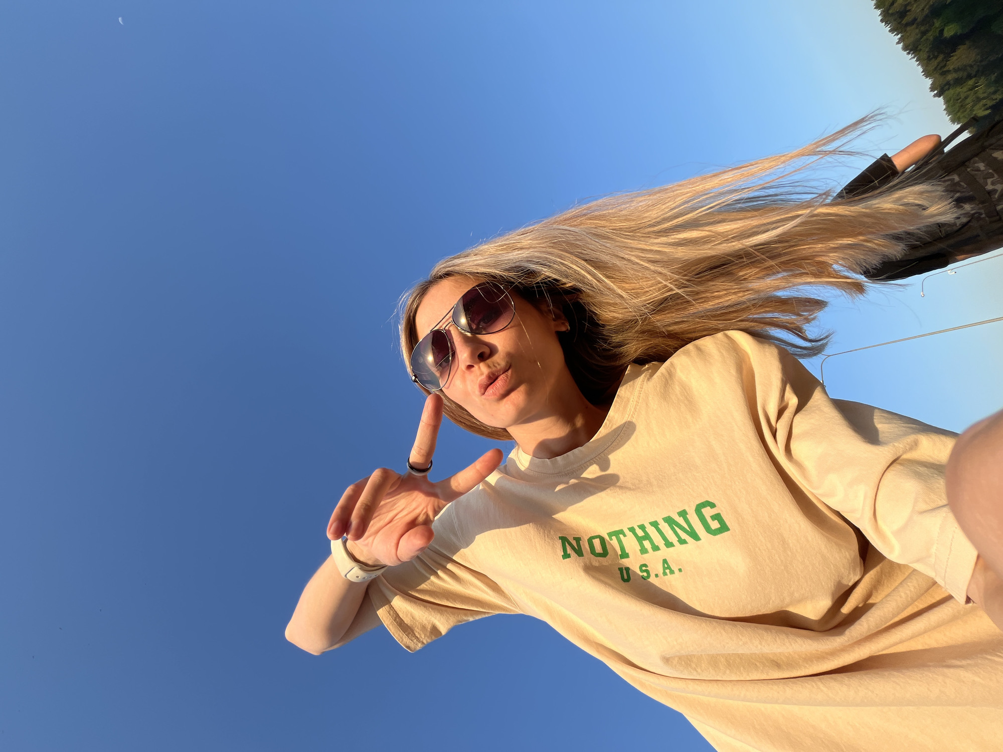 Young women document sunny afternoon outing in Chaikovsky, Russia