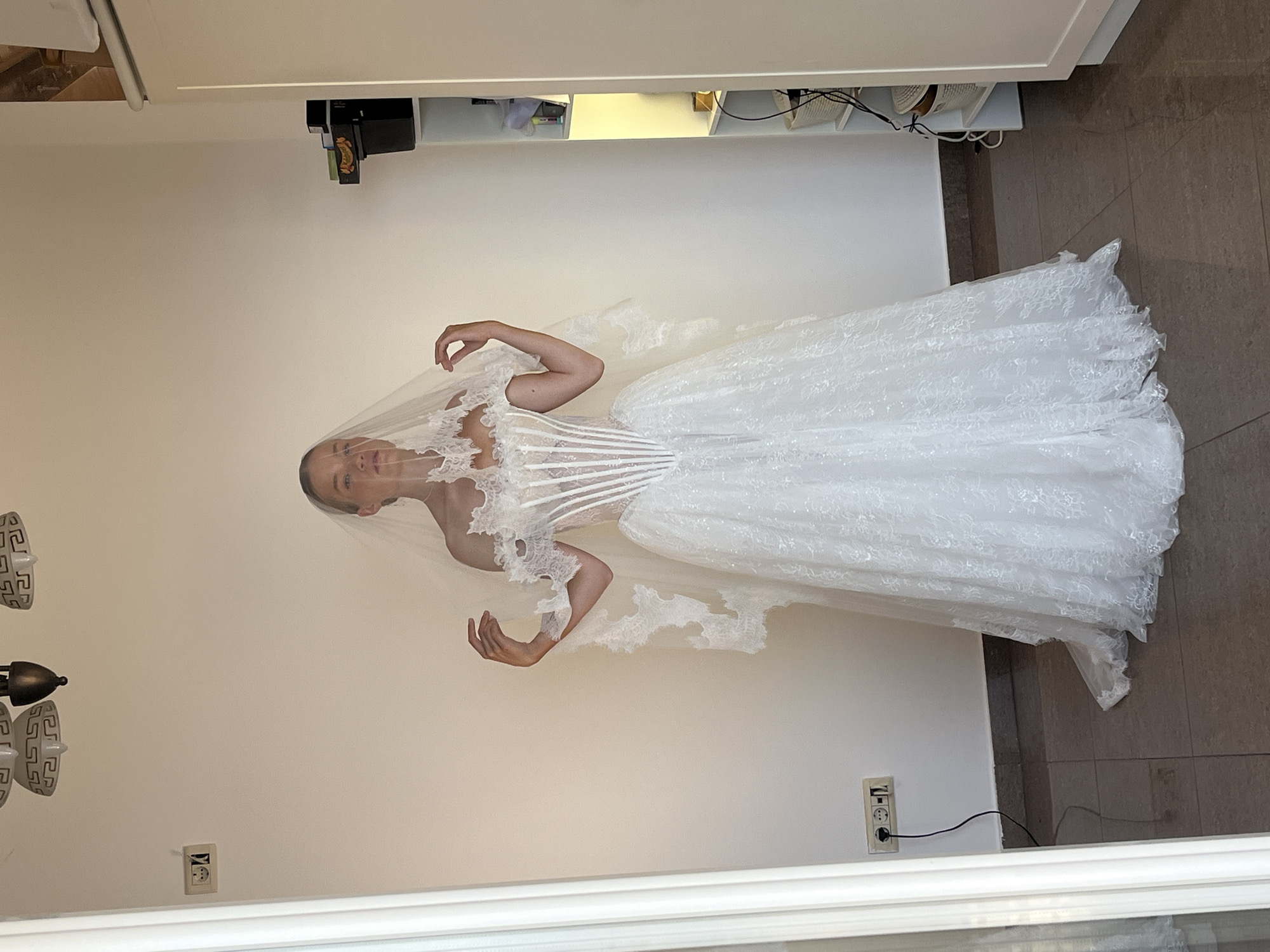Bride poses for wedding photos in Budva indoor session