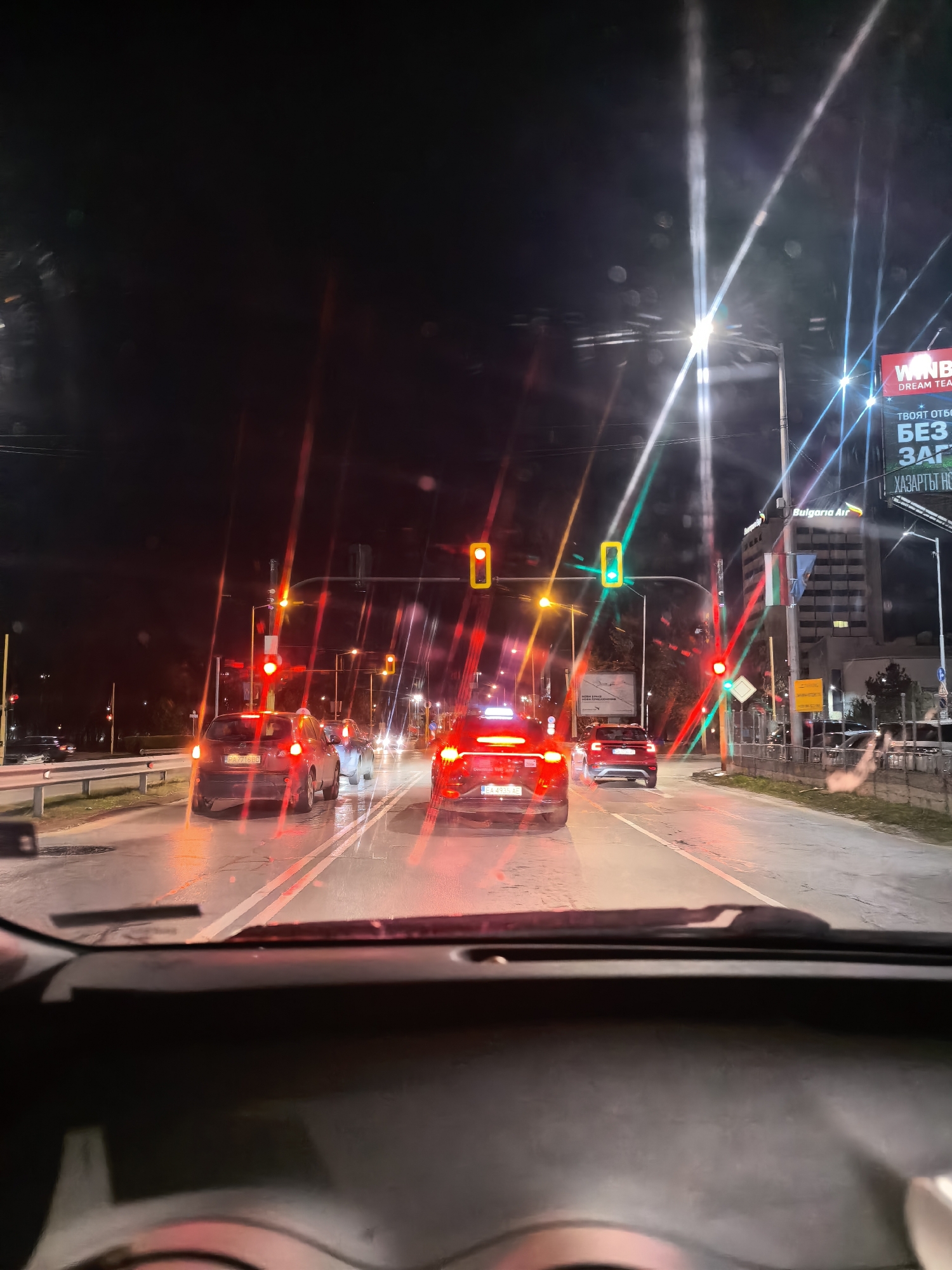 Nighttime drive through suburban streets captured in sequence