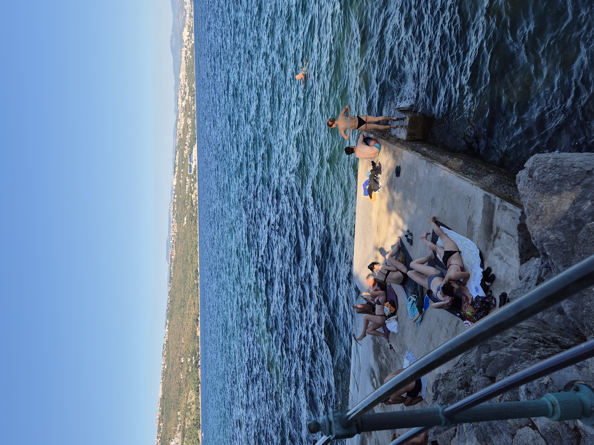 Lazy afternoon at a sunny Mediterranean waterfront