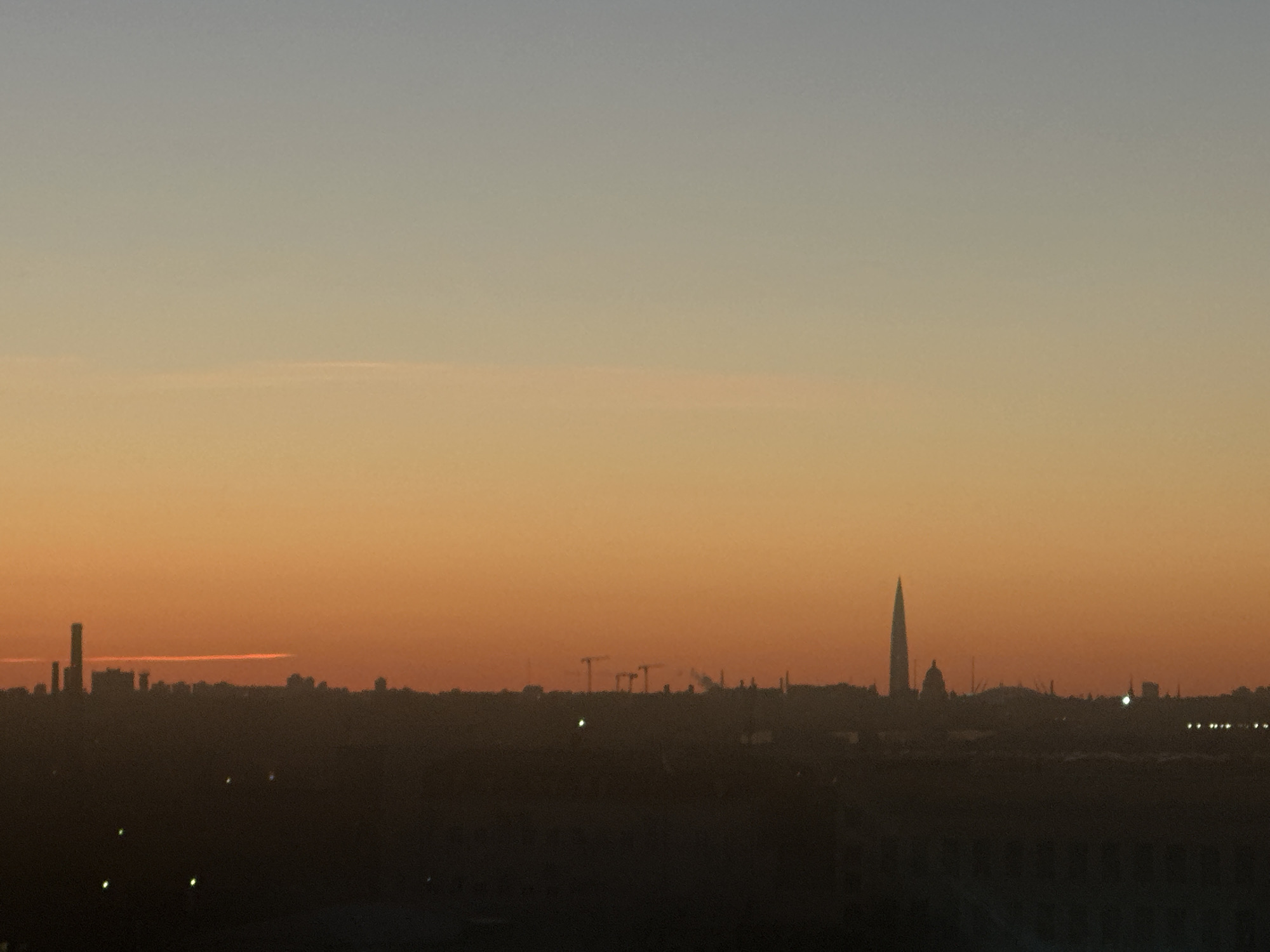 Saint Petersburg skyline captured during golden hour transition