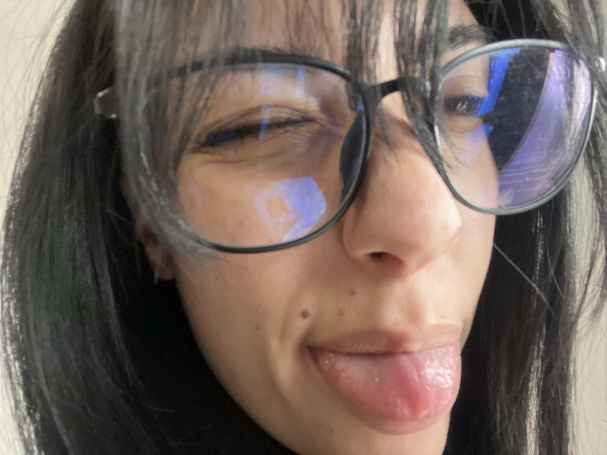 Person takes playful tongue-out selfie in Saedinenie, Bulgaria