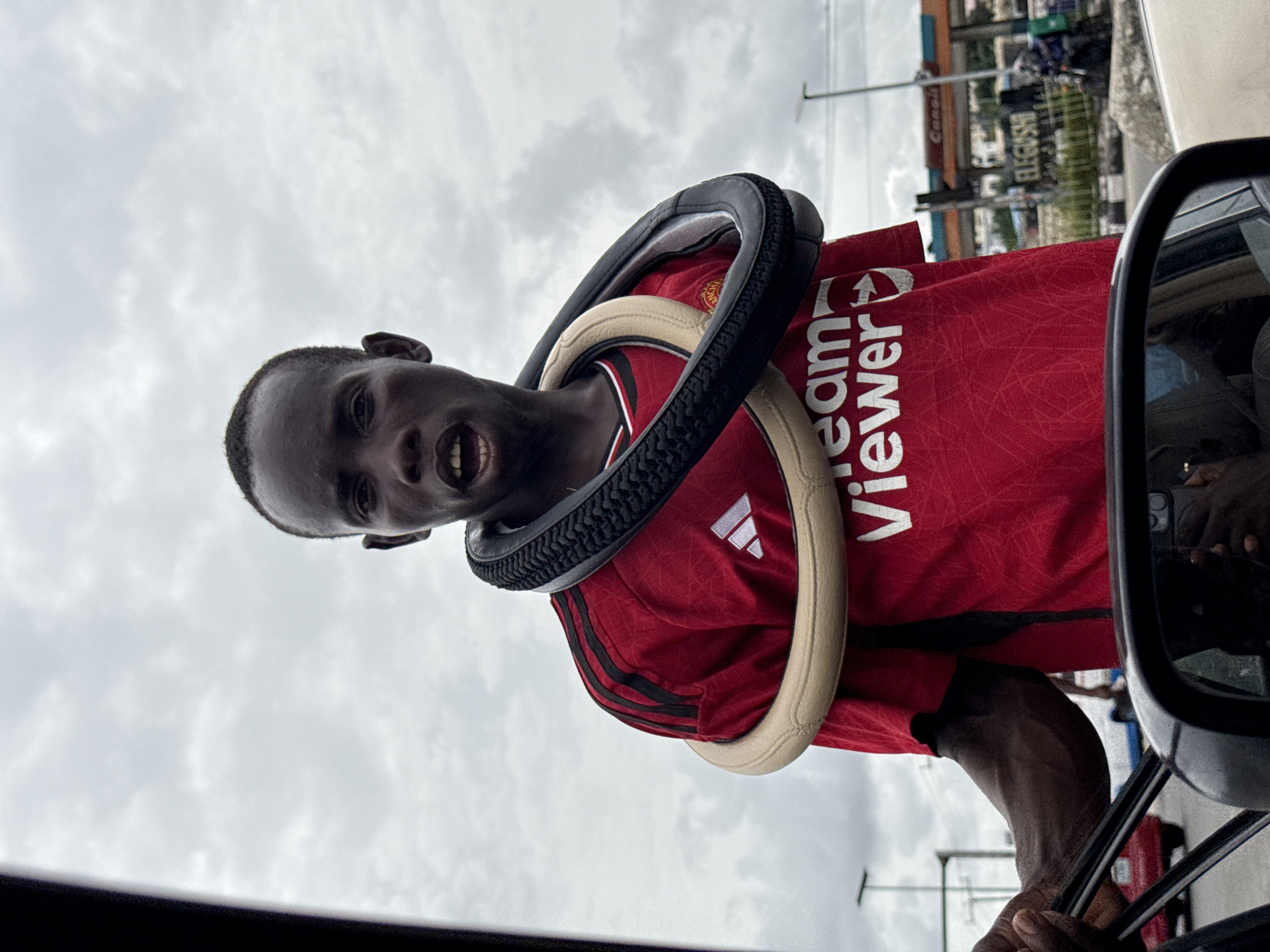 Street life documented in Alaguntan Nigeria during afternoon hours