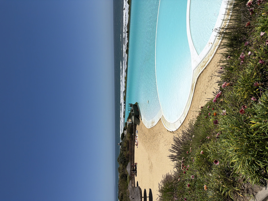Beachgoer enjoys clear skies at Santo Domingo coastal pools
