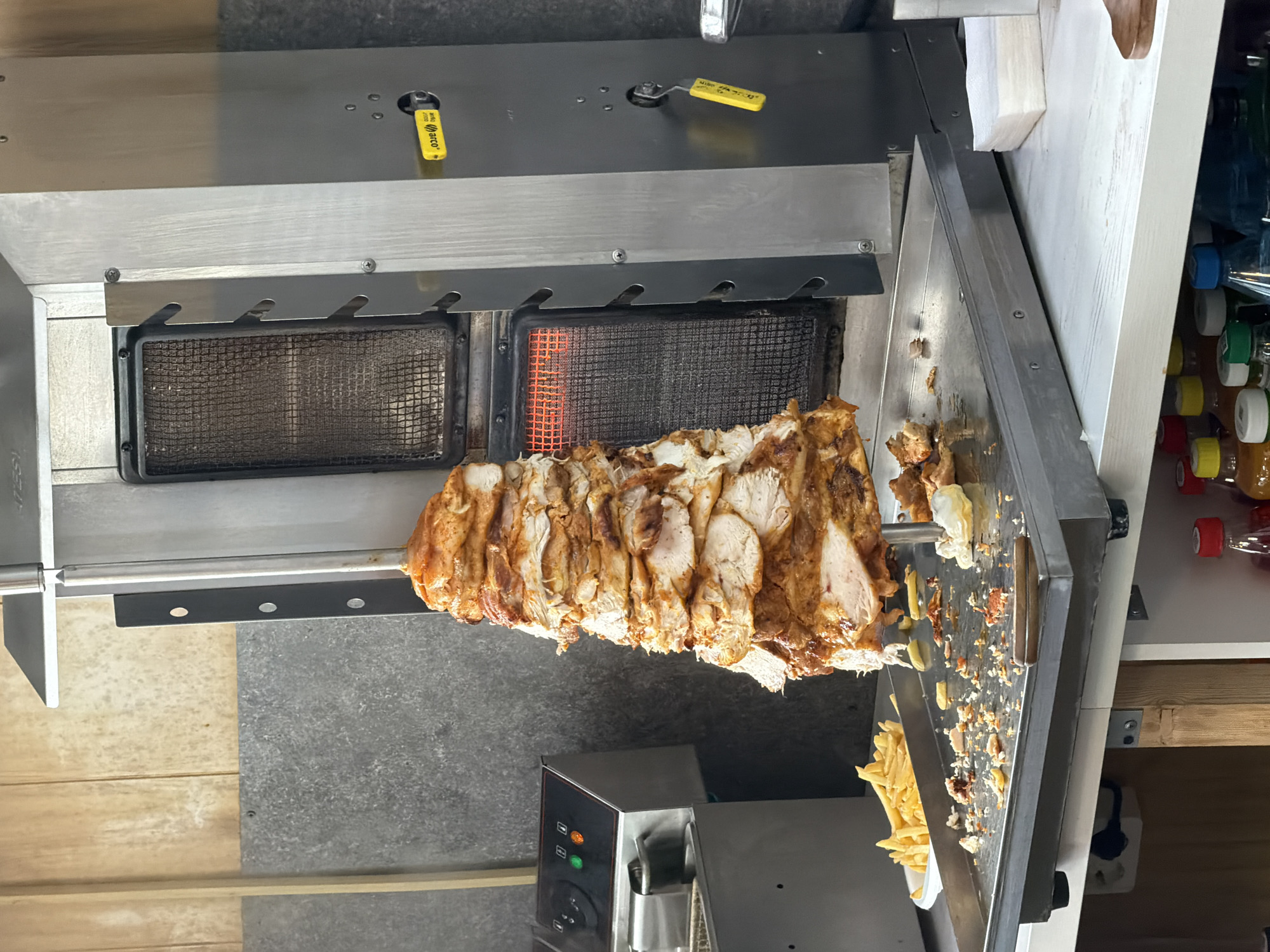 Rotisserie kebab preparation observed in Krasnoyarsk restaurant