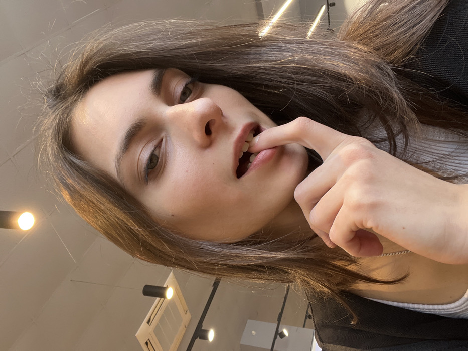 Woman takes morning selfies in Krasnoyarsk retail locations