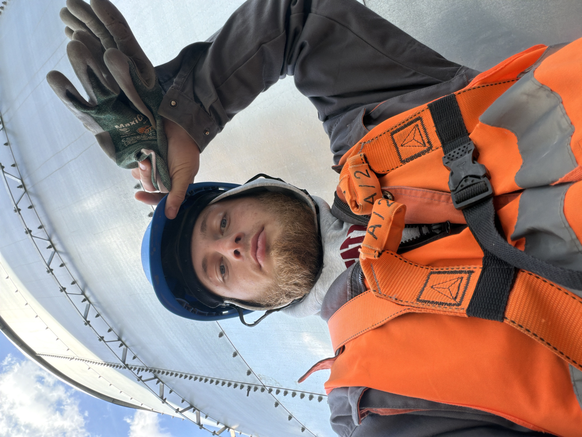 Construction site selfies from inside a rising steel-frame building