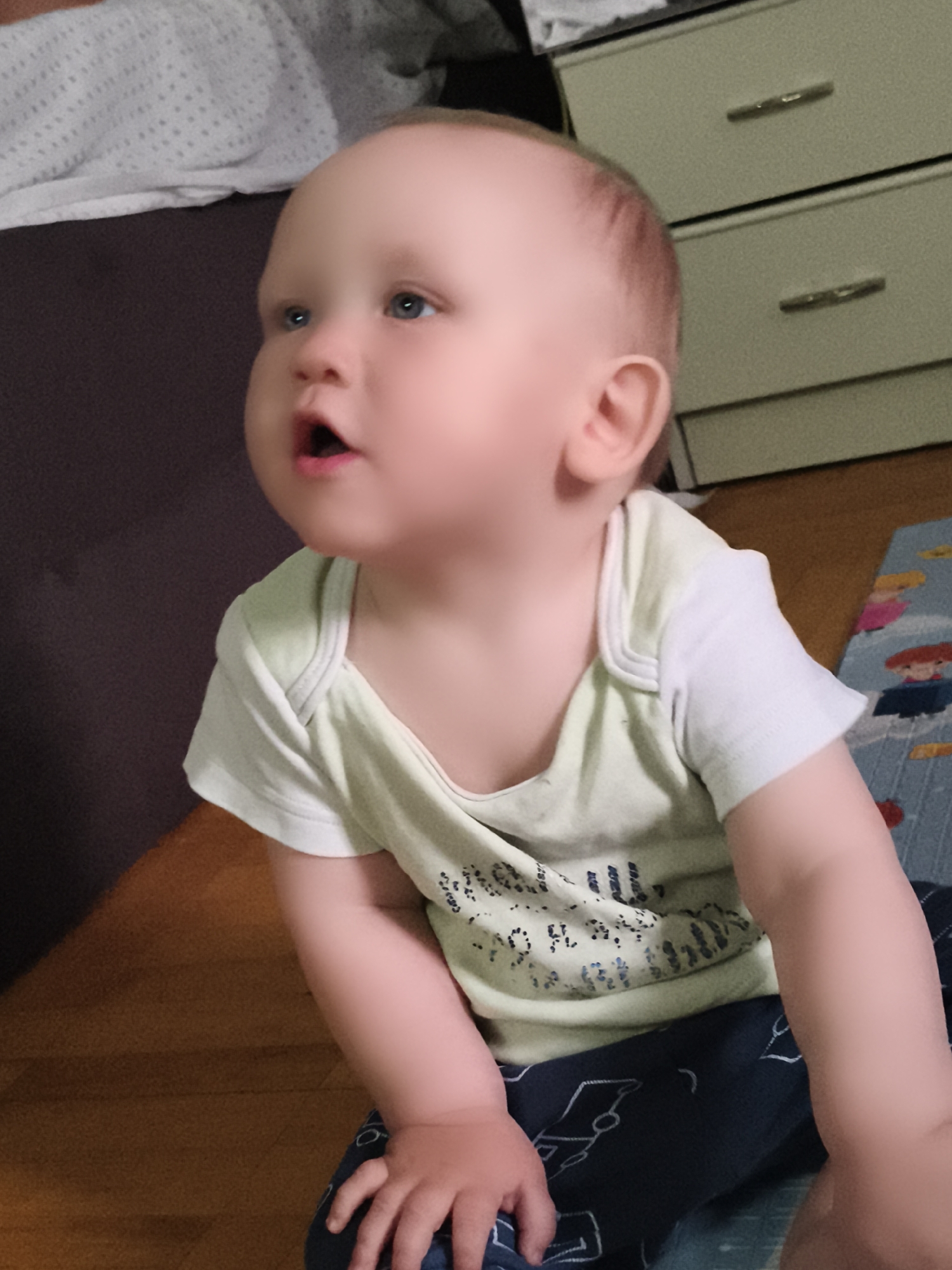 Baby and dachshund share a quiet evening at home in Chaikovsky