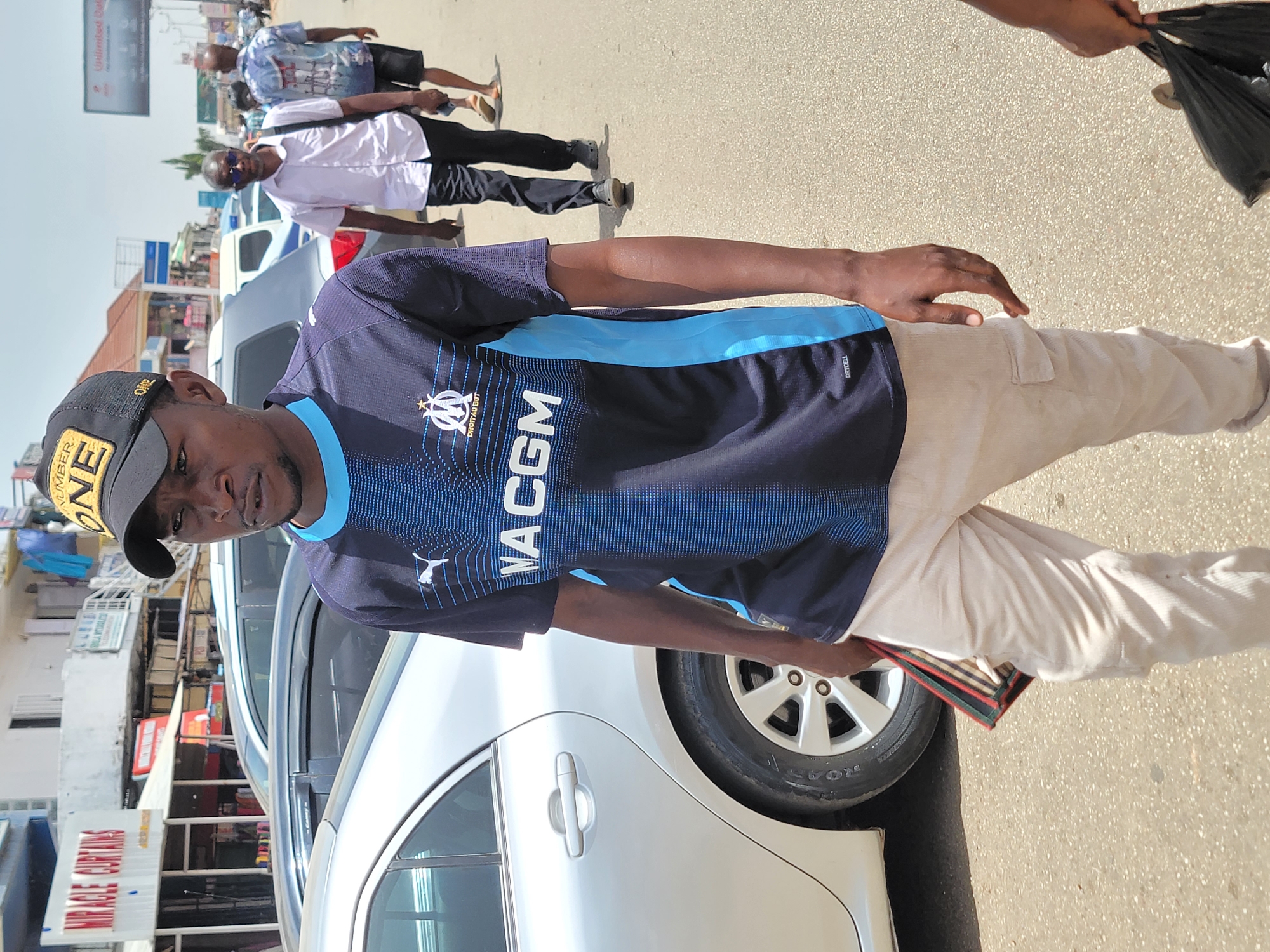 Daily street commerce and pedestrian activity documented in Jos