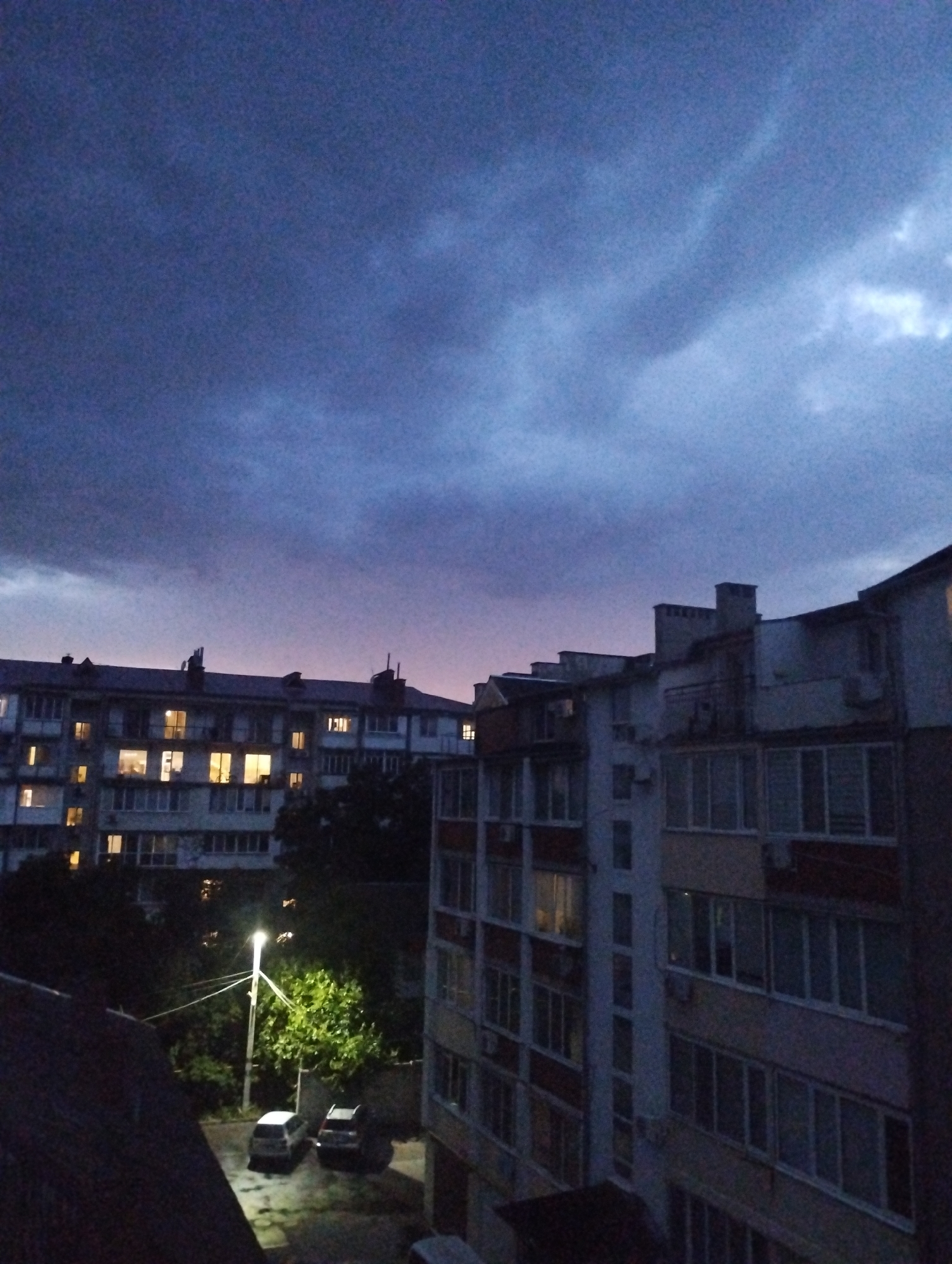 Twilight falls over Chornomorsk apartment blocks, Black Sea coast