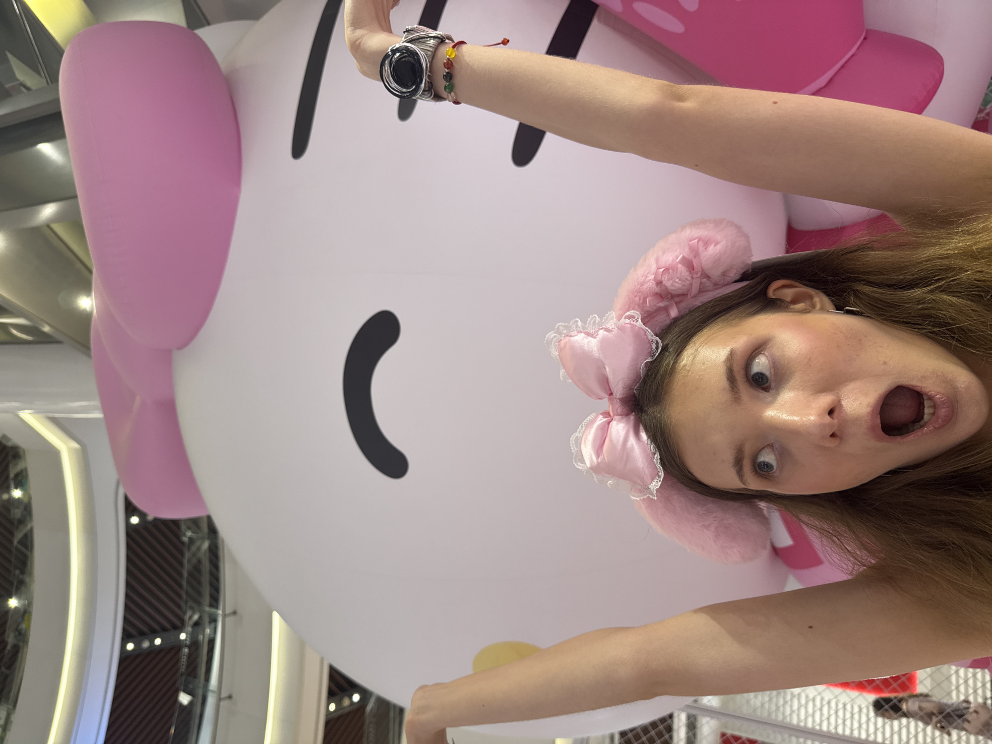 Visitors pose with Hello Kitty display, dine at Shanghai mall