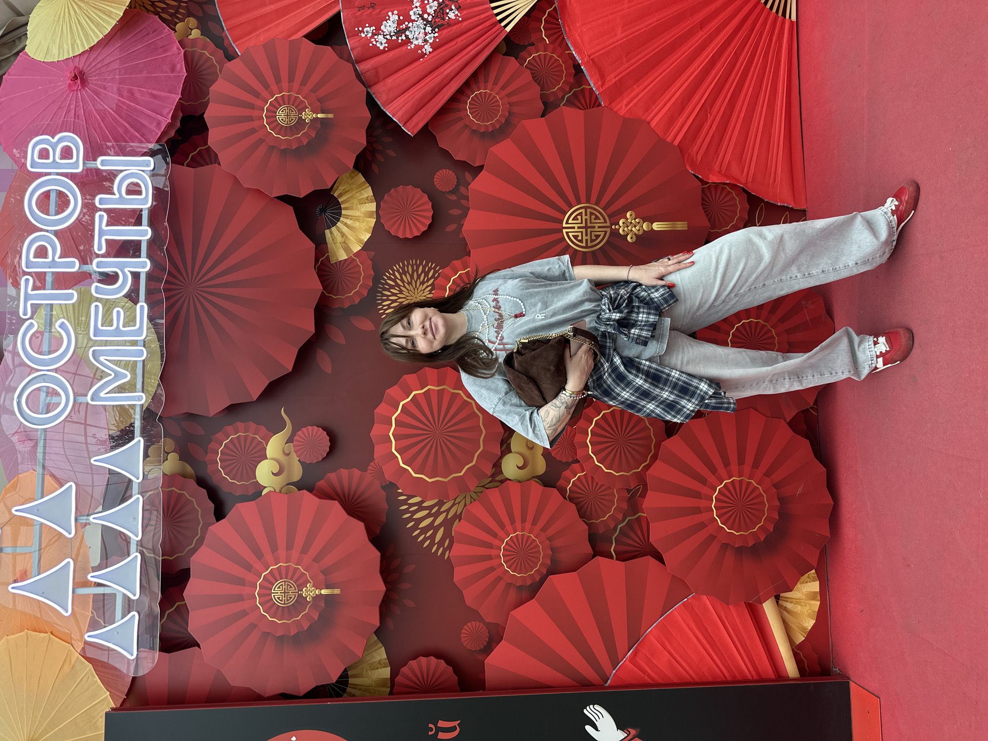 Woman visits Chinese restaurant, Dream Island amusement park in Moscow