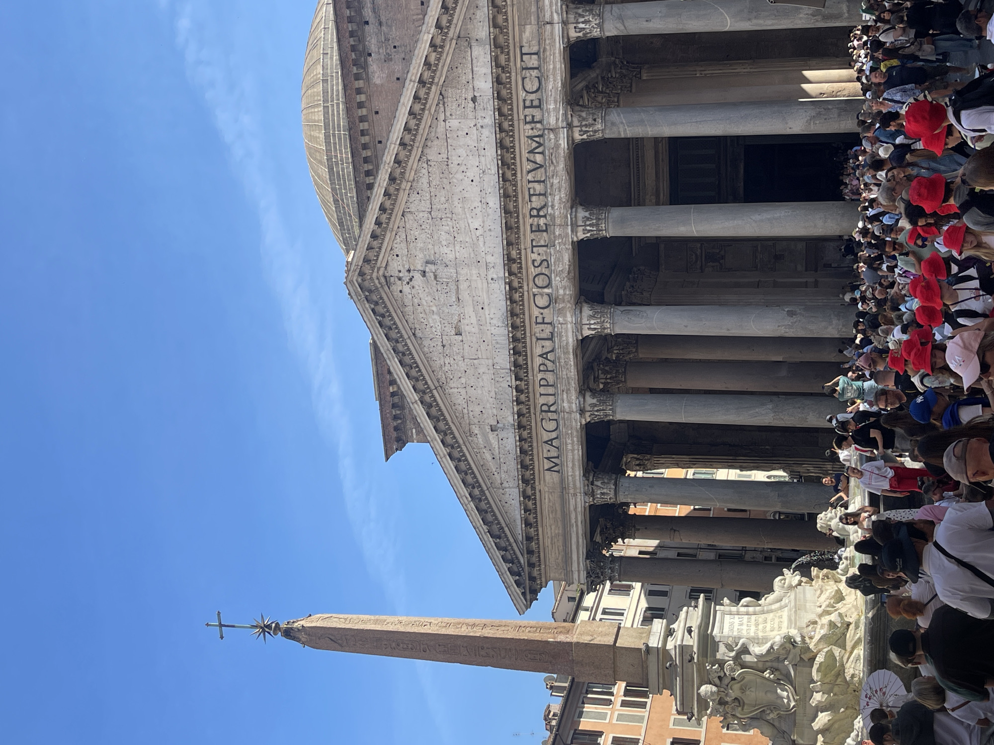 Tourists visit Pantheon and baroque church in Rome