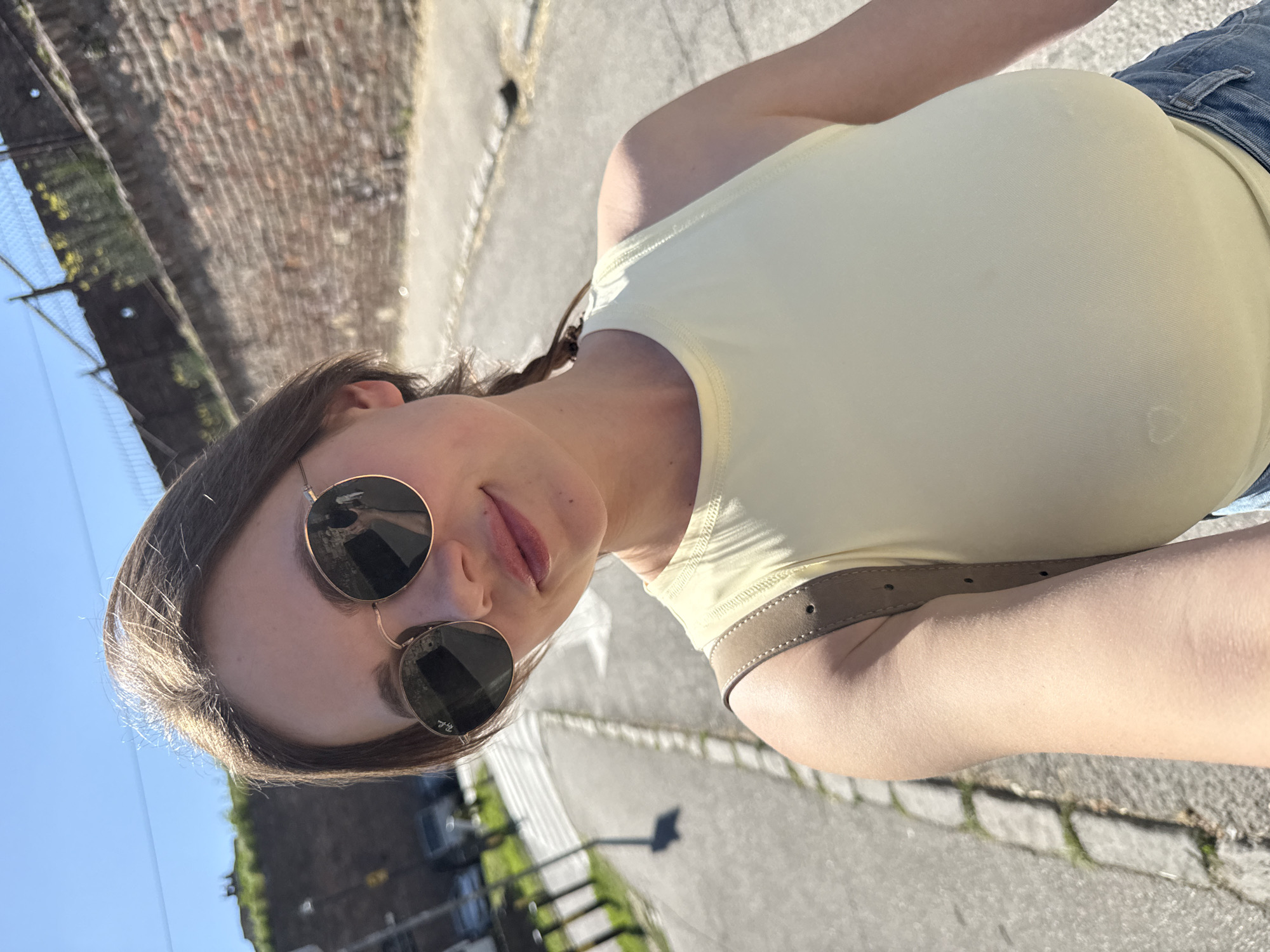 Woman takes selfie near blooming tree in Belgrade