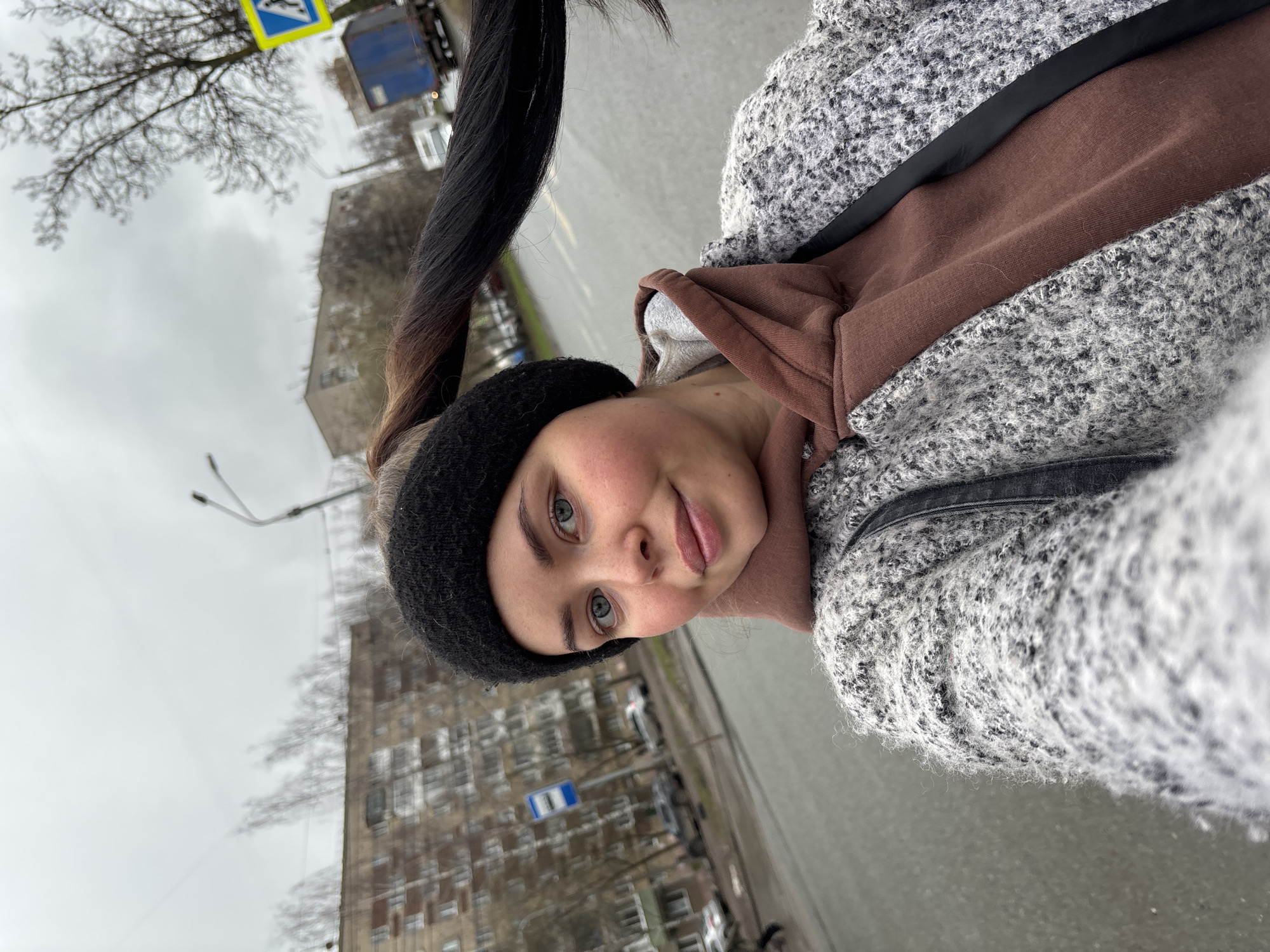 Woman takes selfie on overcast day in Izhevsk