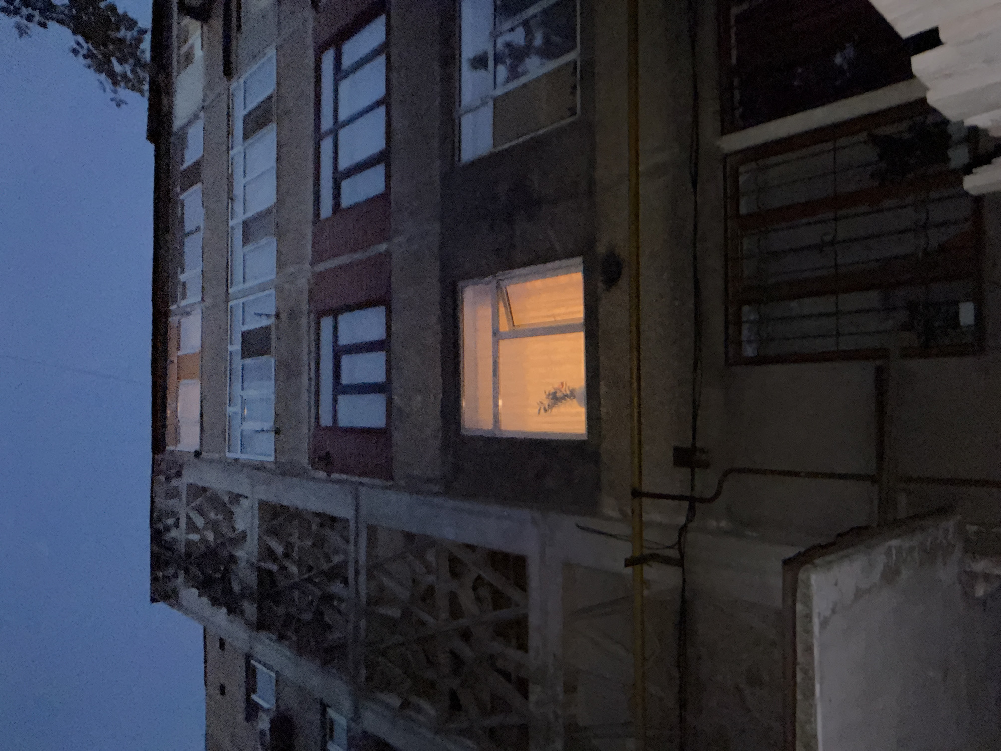 Afternoon to nightfall across a Shymkent residential neighborhood