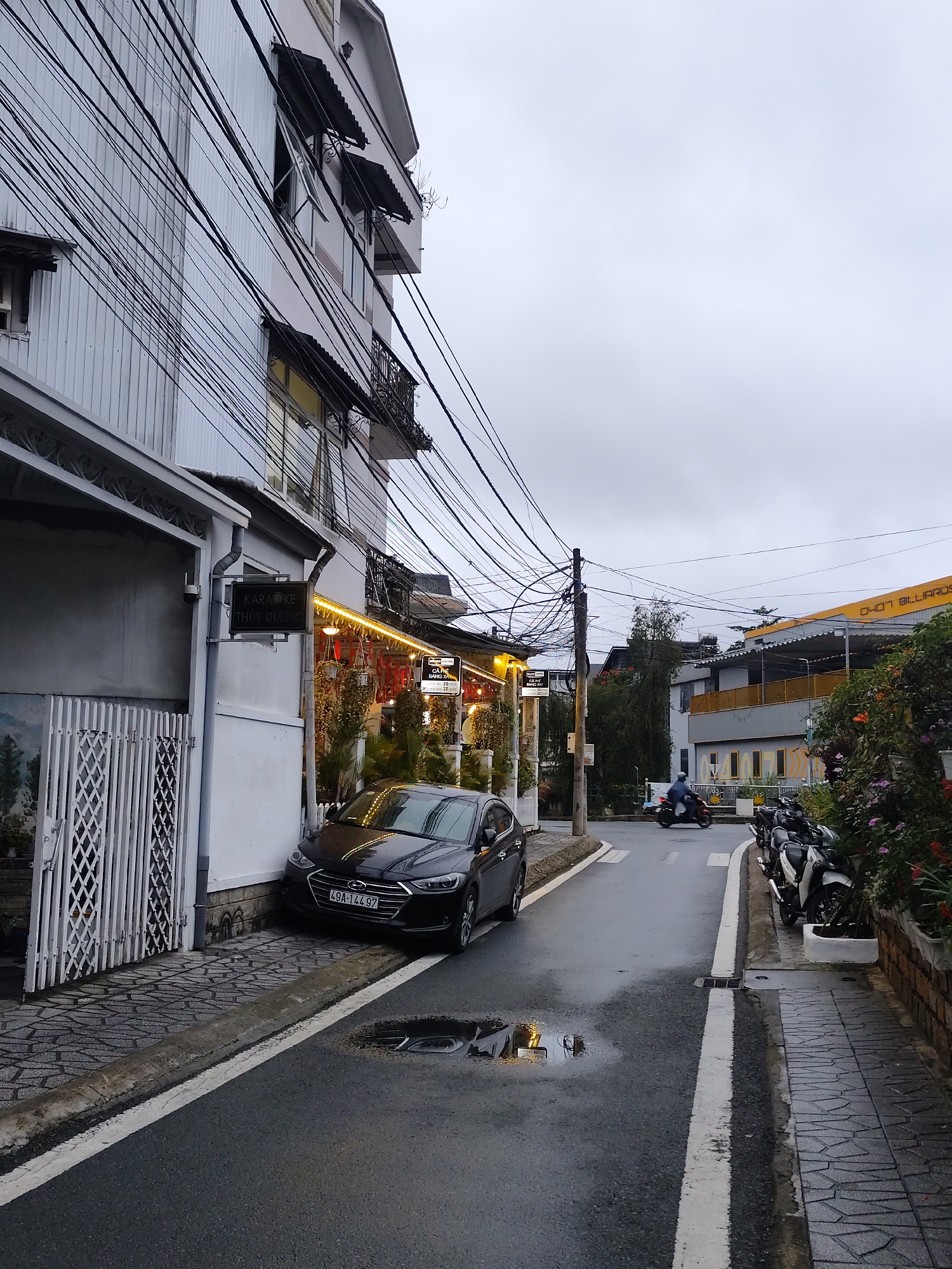 Wet streets and colonial architecture in rainy Da Lat