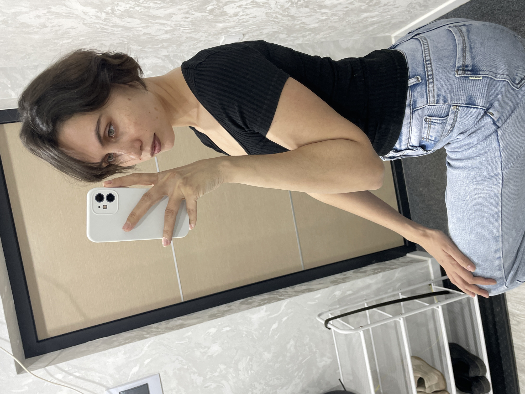 Woman takes mirror selfies in yellow outfit, Izhevsk